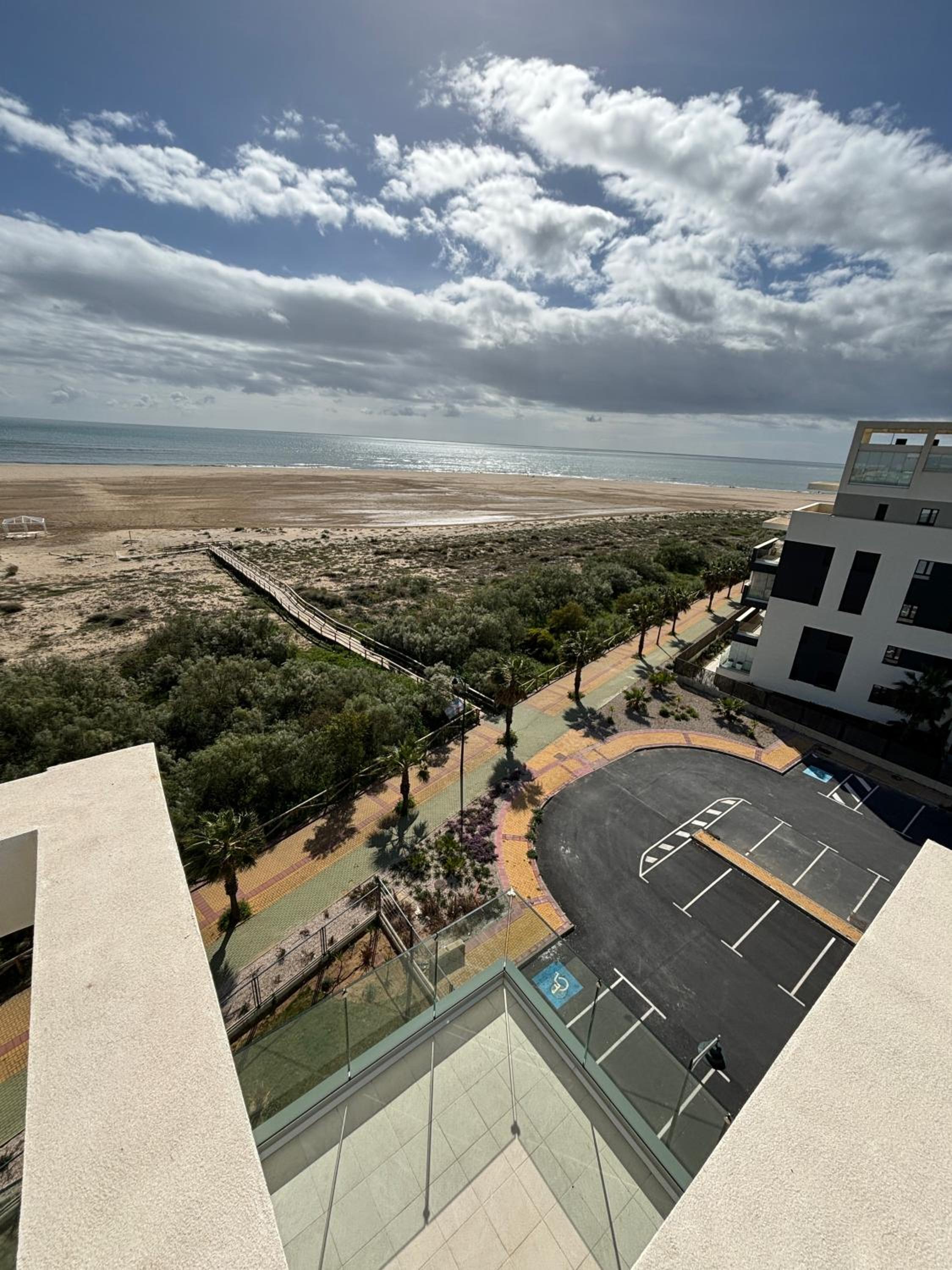 New penthouse with sunny beach view