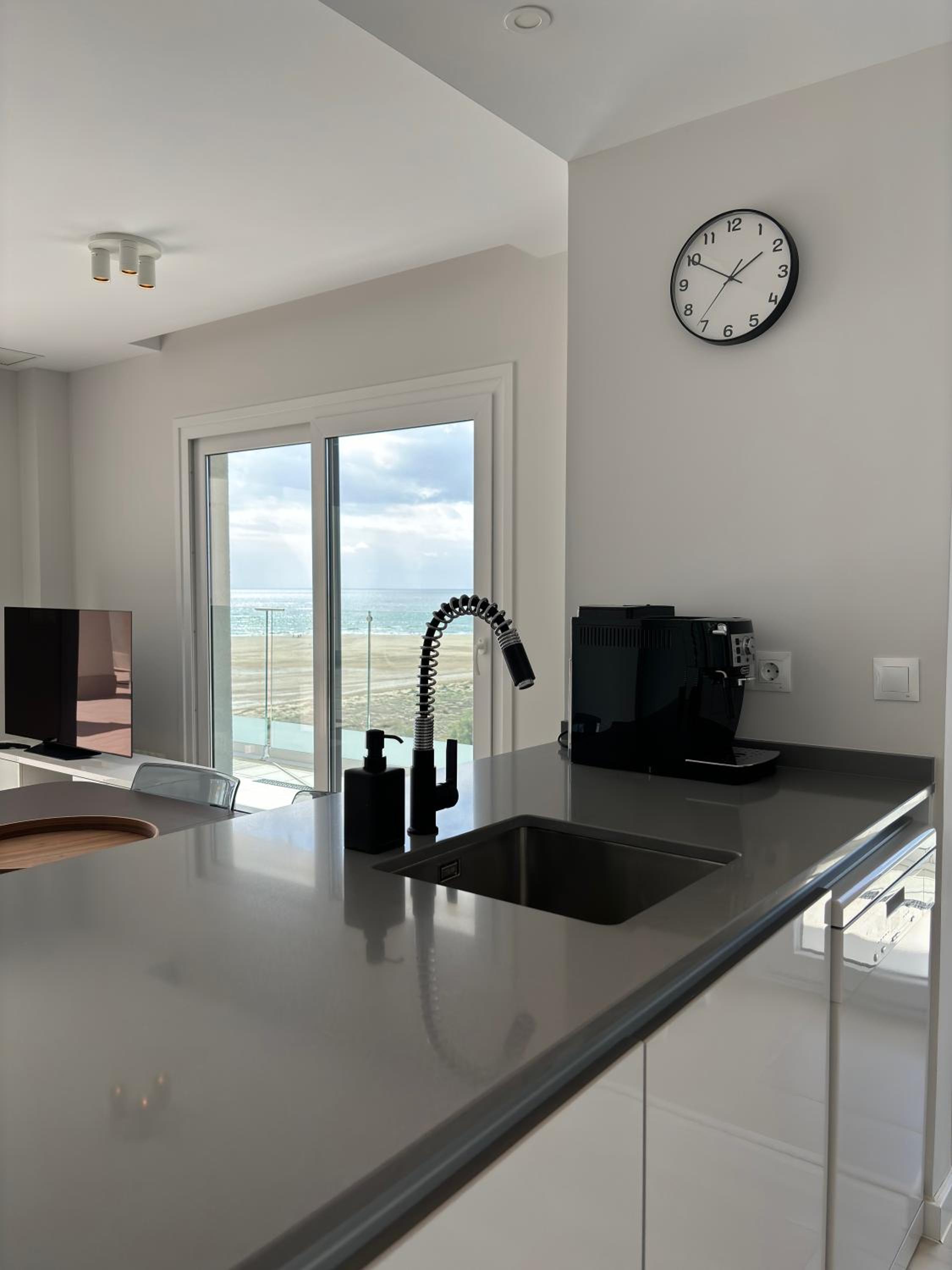 New penthouse with sunny beach view