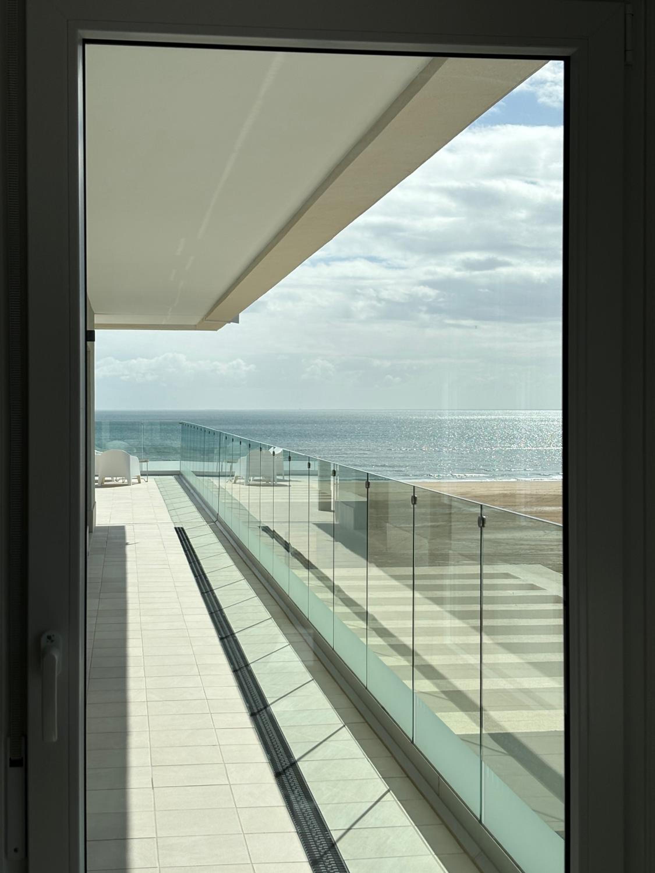 New penthouse with sunny beach view