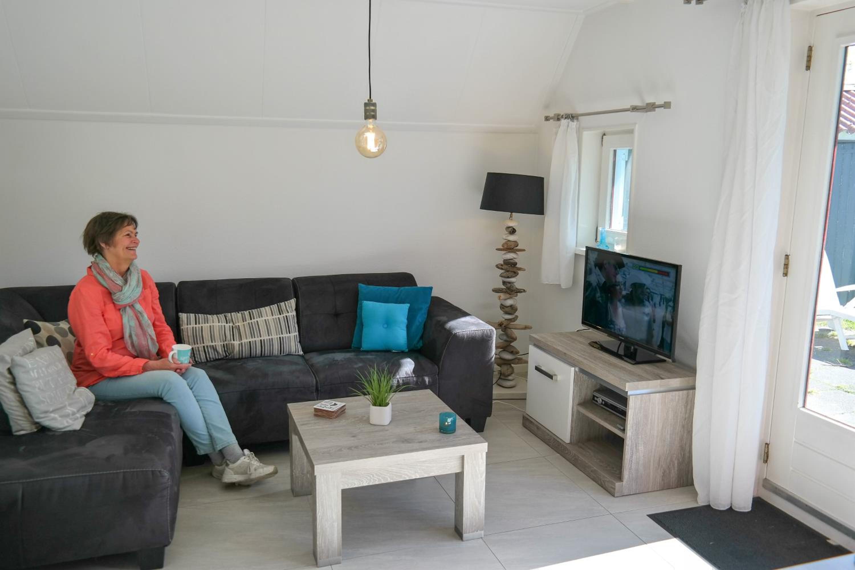 Lilian Modern Holiday home at a typical dutch canal, close to the Lauwersmeer