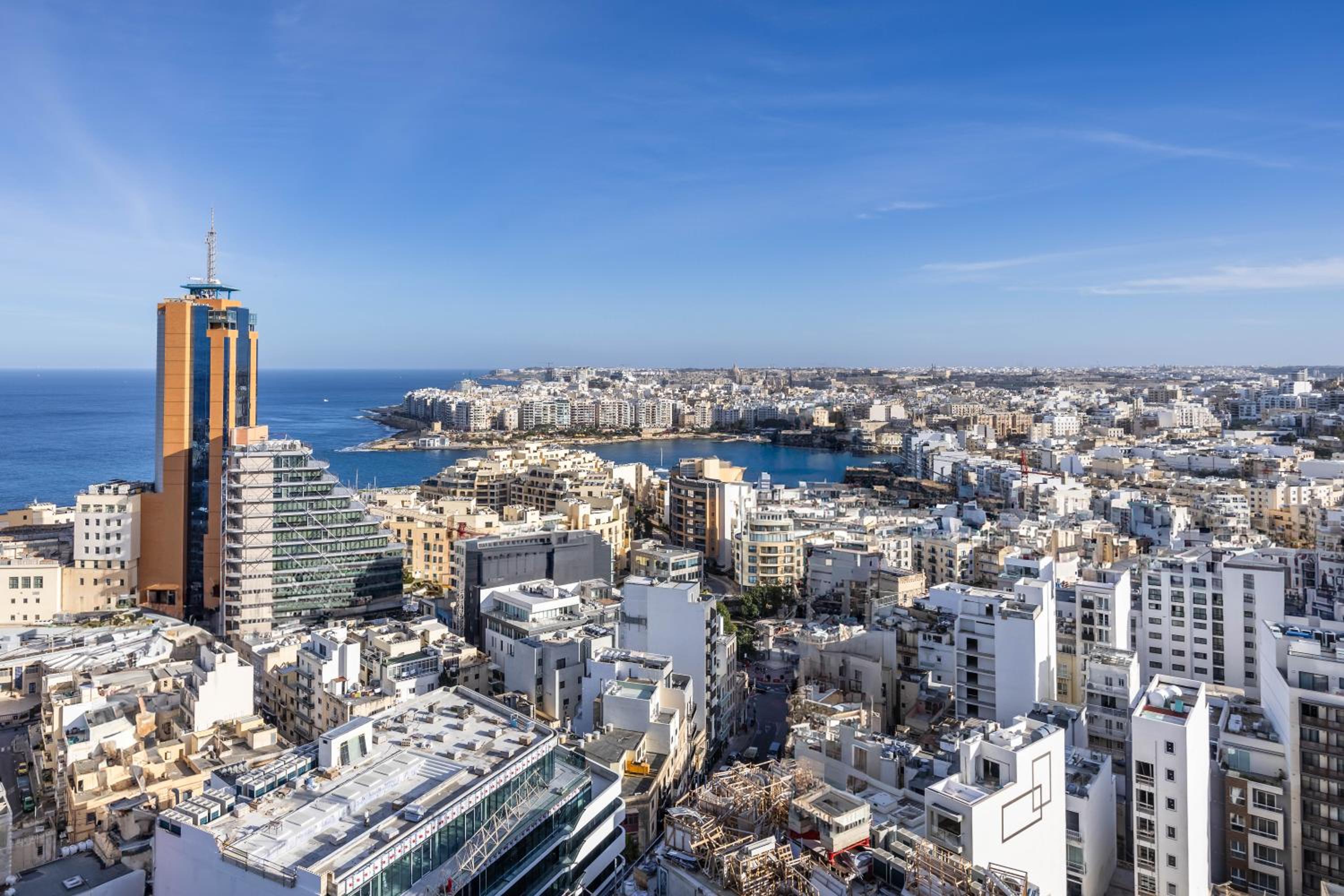 18th floor 1BR unit in Mercury tower by SF HOMES — St Julian's