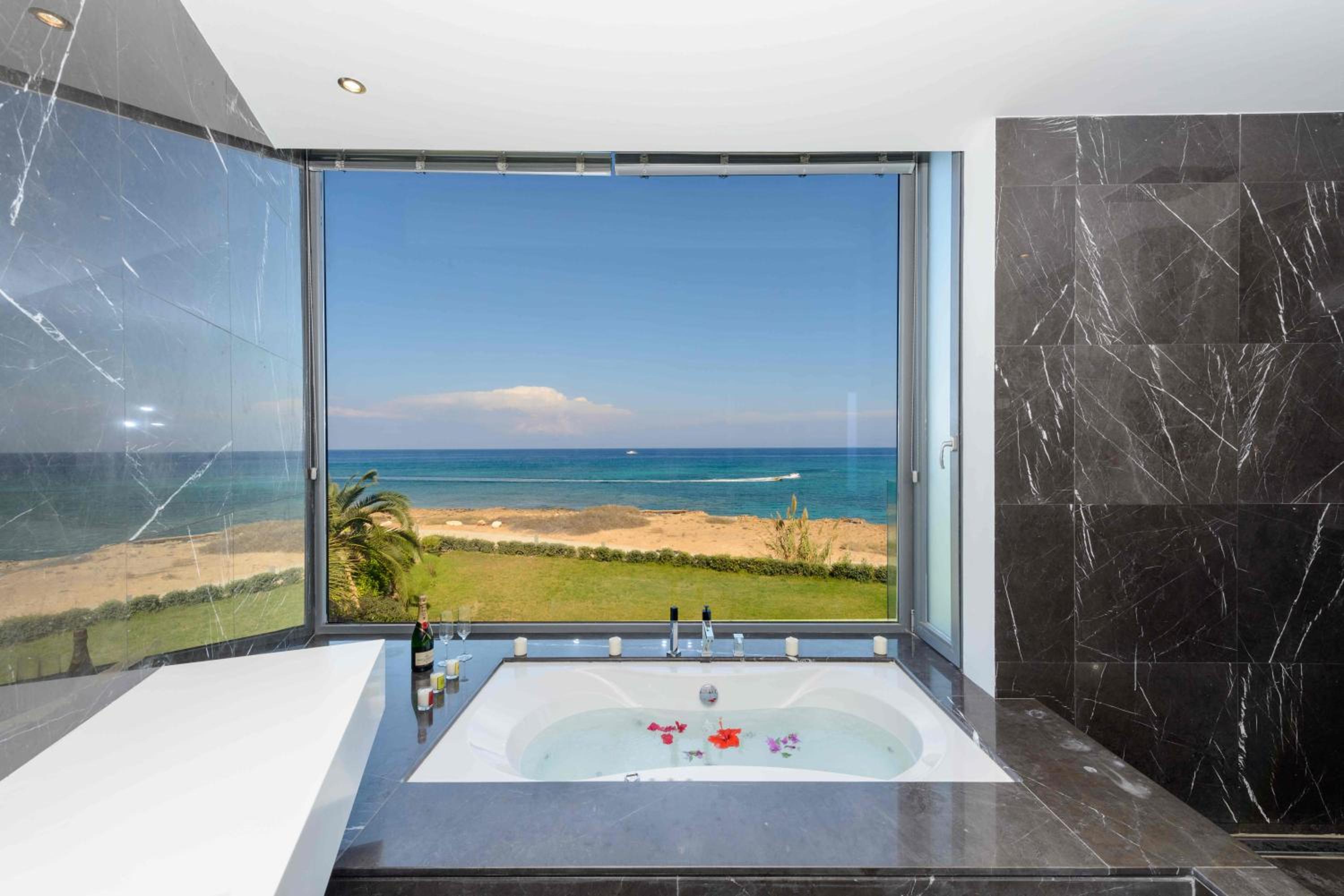 Luxury villa by the sea with heated pool