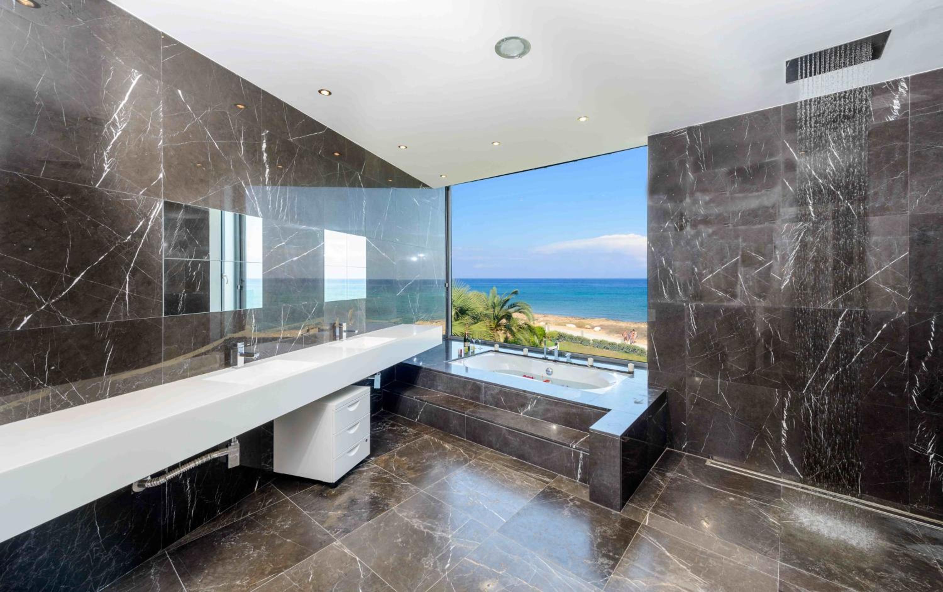 Luxury villa by the sea with heated pool