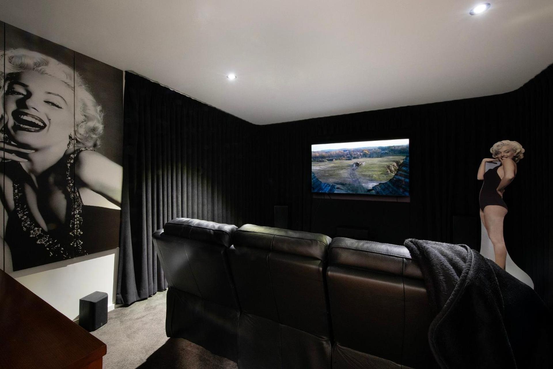 Alofi- stunning views and a private cinema room!