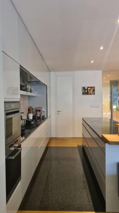 Exceptional calm 3BR, 2.5BA apartment with patio, pool & gym