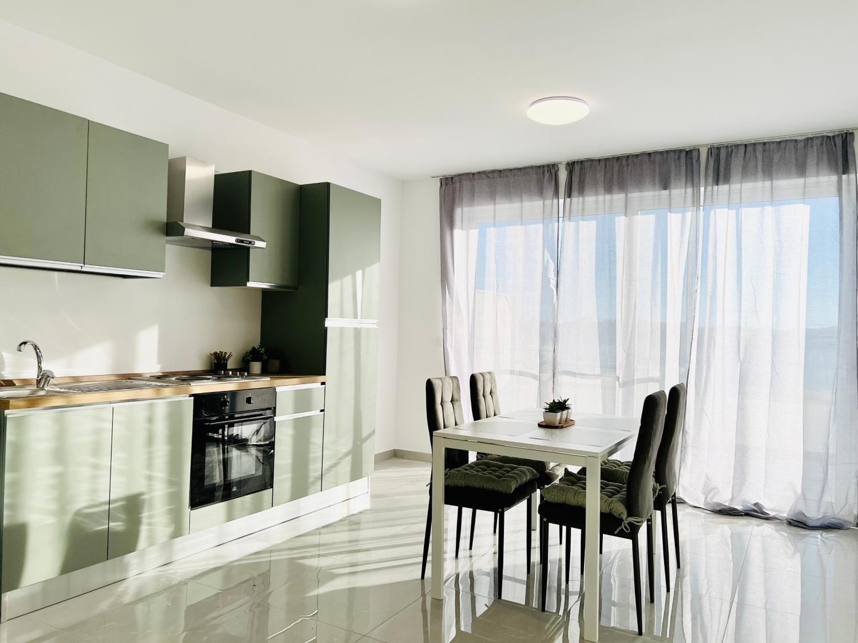 SUNSHINE SUITS - BRAND NEW APARTMENTS view 3