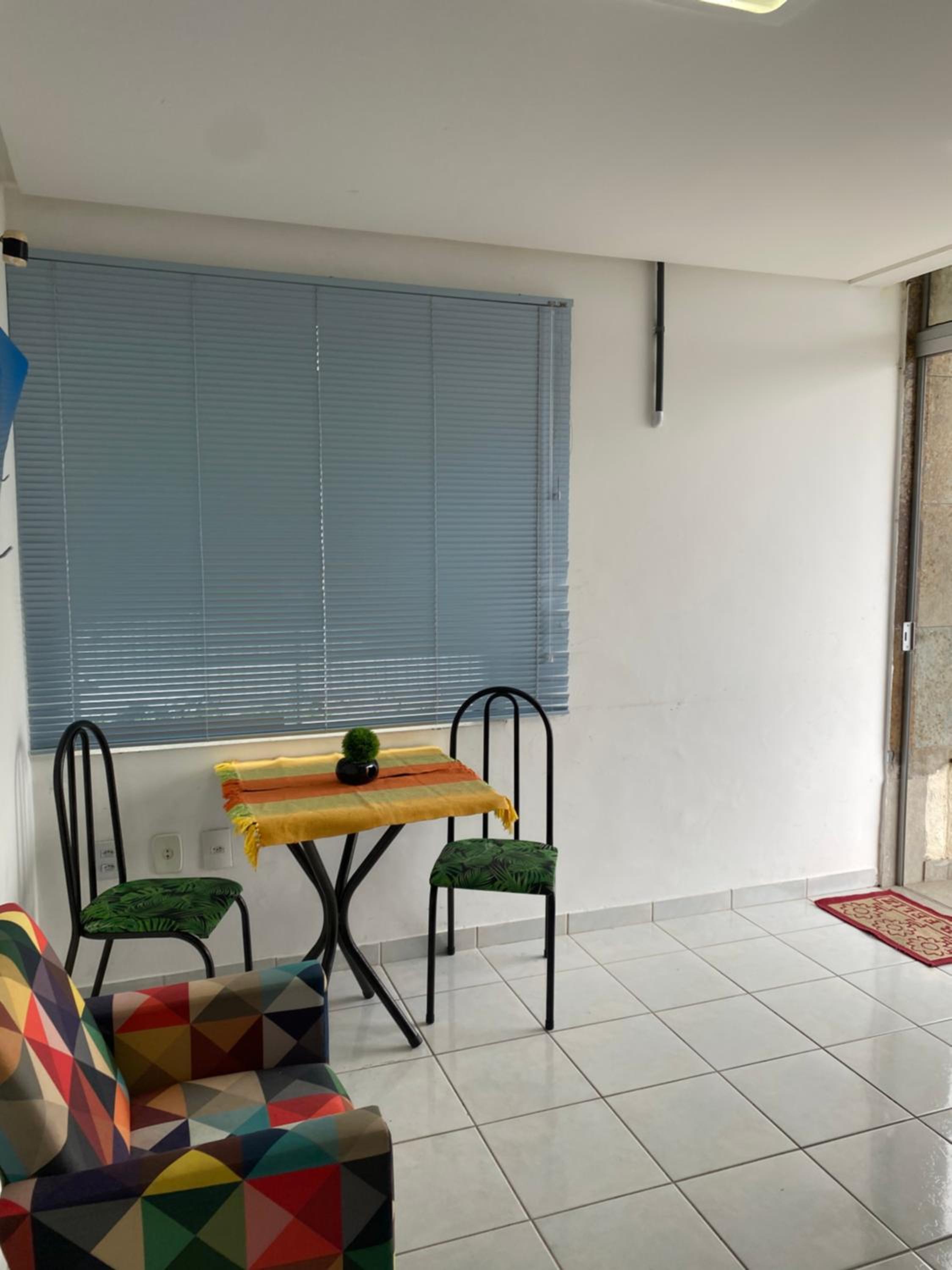 Quarto e sala pé na areia
