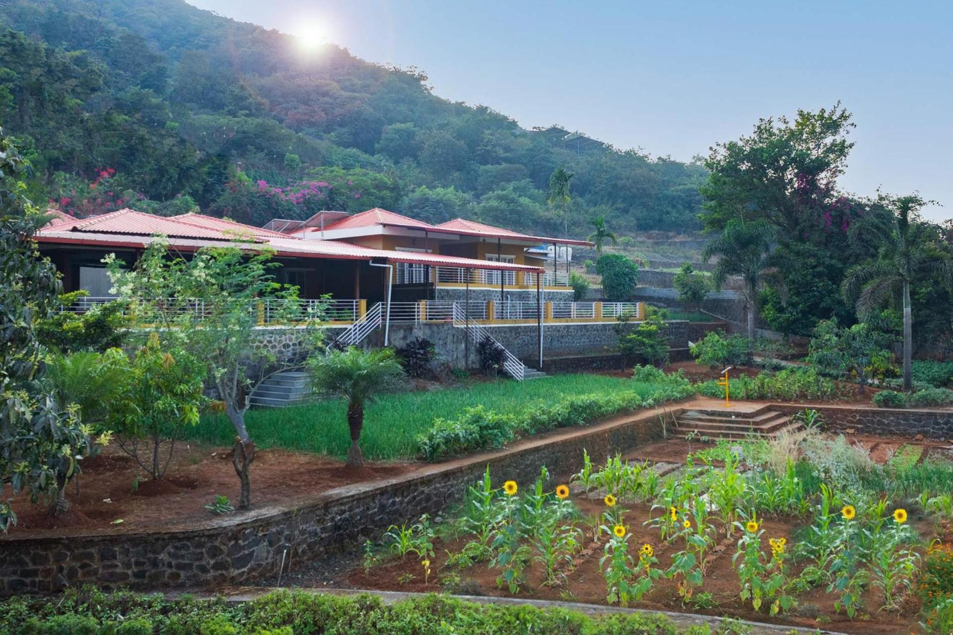 Ekam Lake House by StayVista with Mountain & Lake views, Outdoor jacuzzi, Sauna, Modern amenities & Kitchen garden view 2