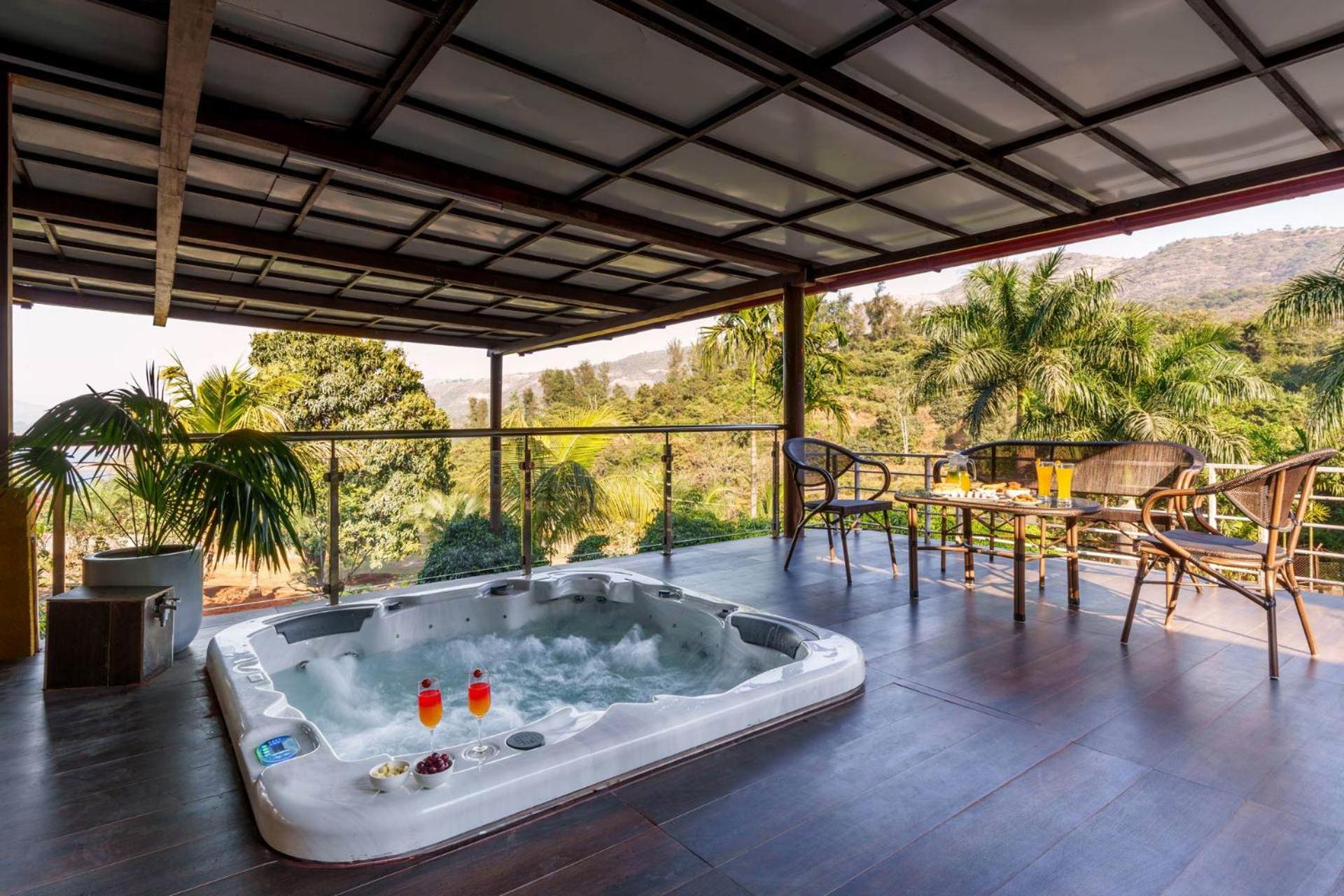 Ekam Lake House by StayVista with Mountain & Lake views, Outdoor jacuzzi, Sauna, Modern amenities & Kitchen garden view 3