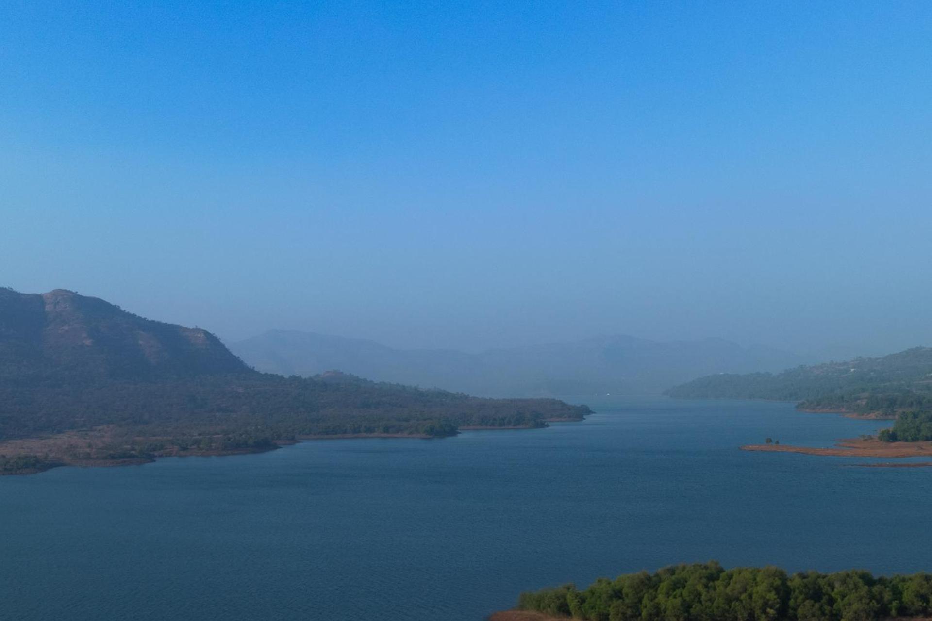 Ekam Lake House by StayVista with Mountain & Lake views, Outdoor jacuzzi, Sauna, Modern amenities & Kitchen garden view 4