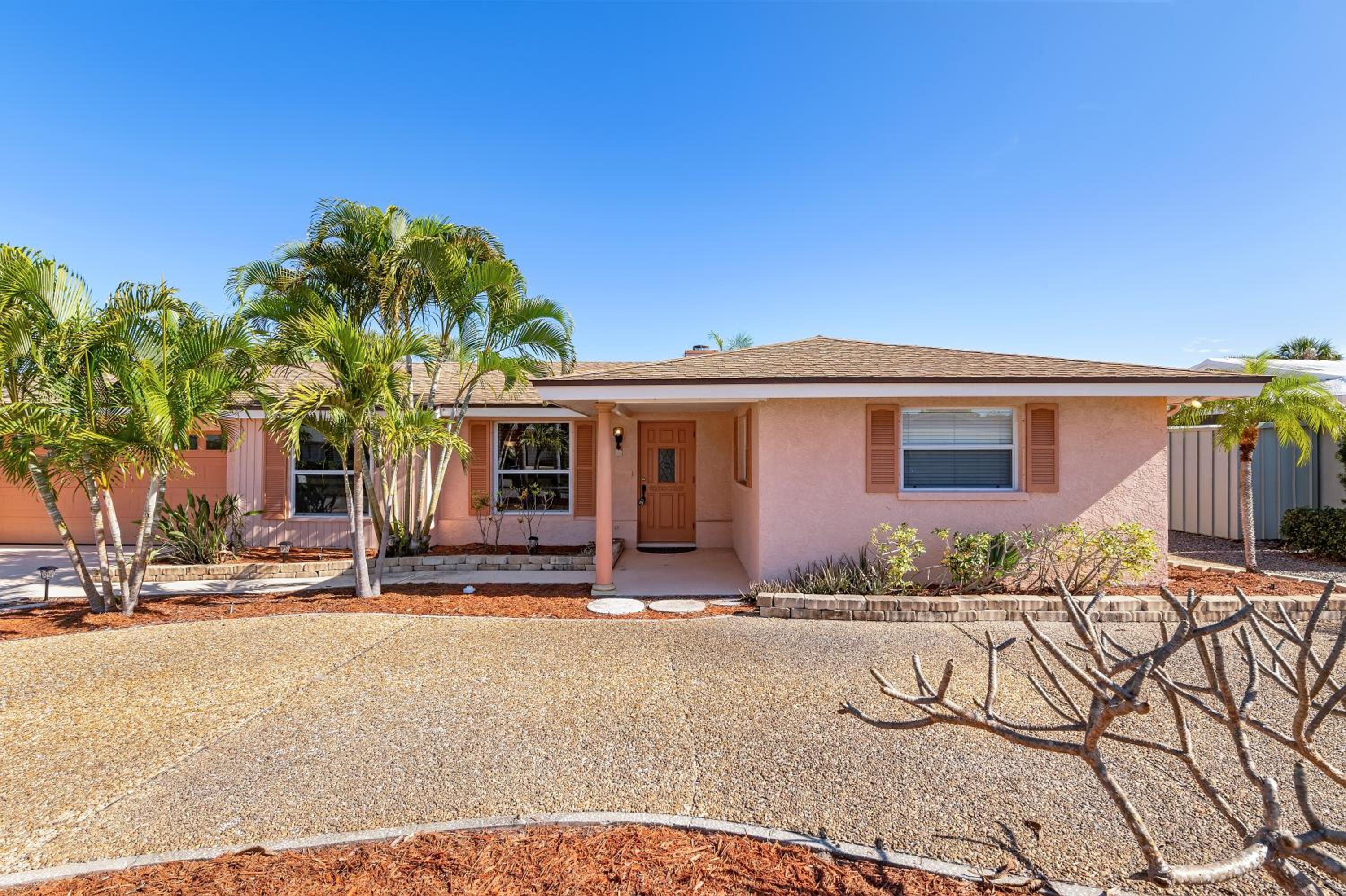 Coral Breeze! Beautiful waterfront pool home with spa! minutes from the beach