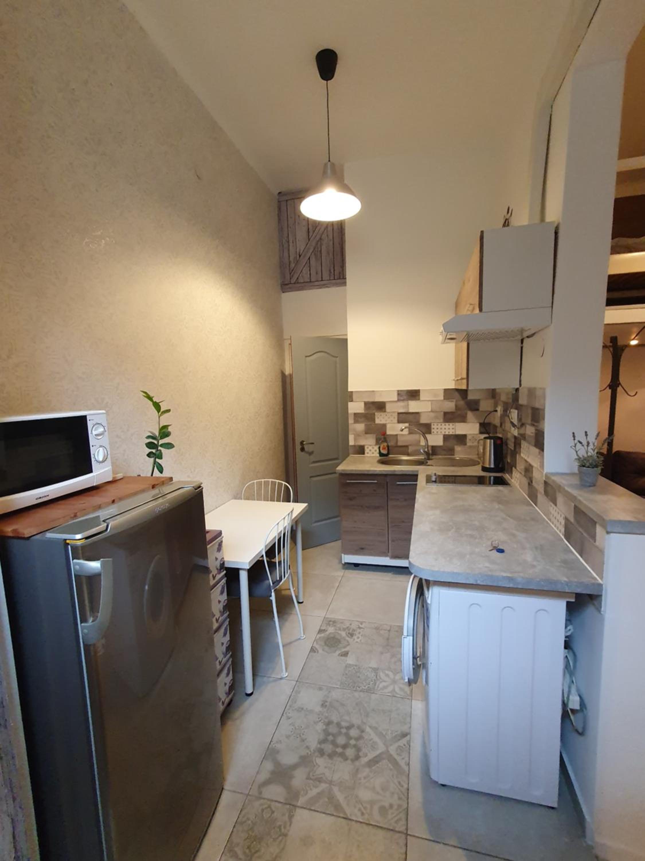 Cozy studio apartment with Air condition view 5