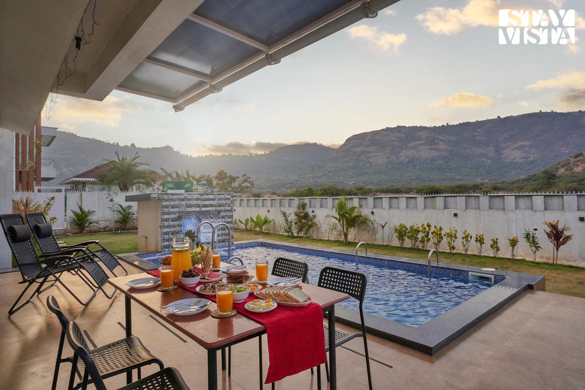 StayVista's Kaarma Villa - Valley-View Villa with Outdoor Pool, Lawn featuring a Gazebo & Machan view 4