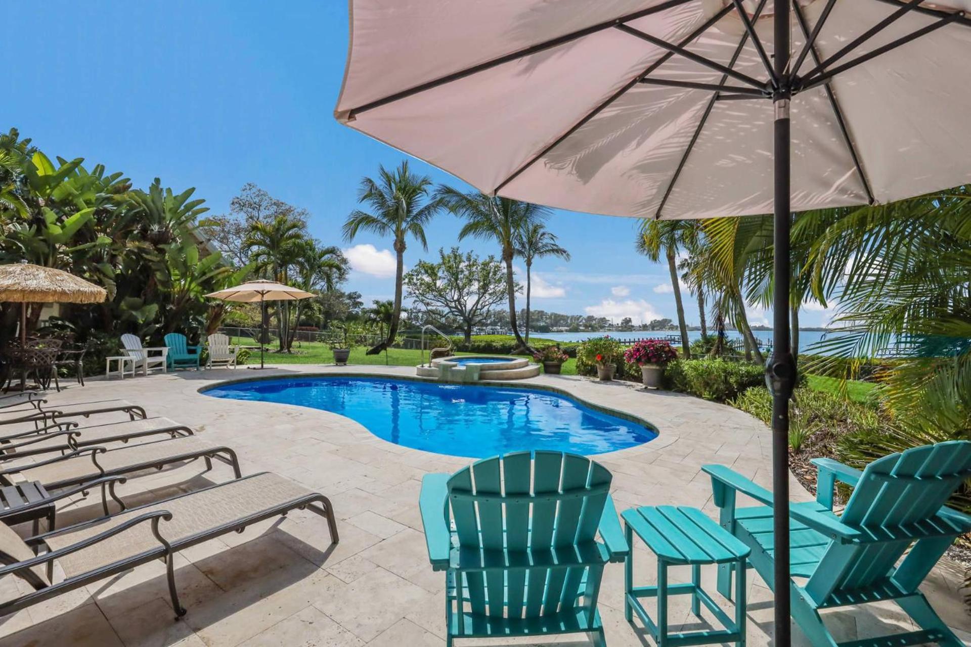 Palma Sola Bay House! Private Dock, Heated Pool & Spa, Game Room & More! view 2