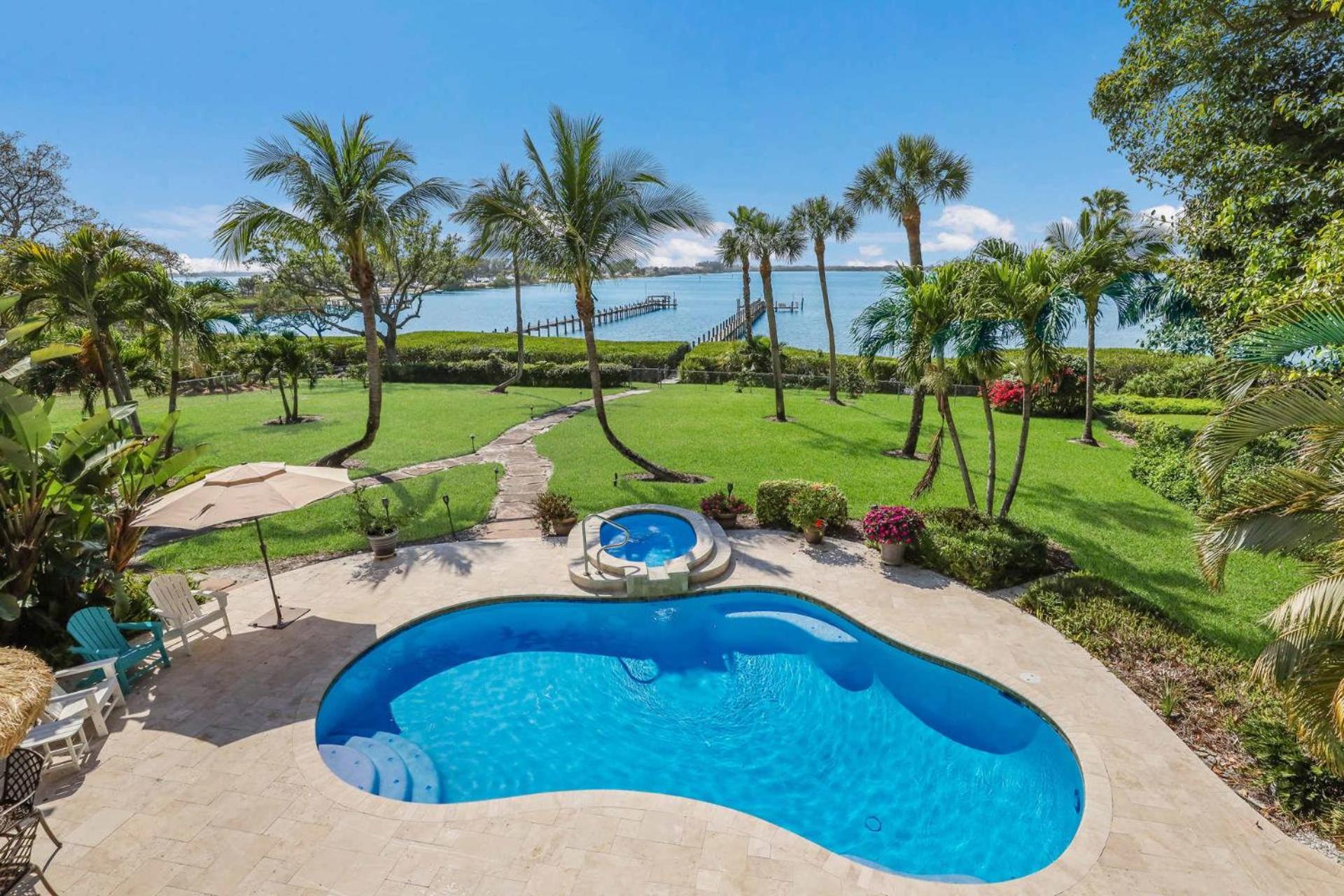 Palma Sola Bay House! Private Dock, Heated Pool & Spa, Game Room & More! view 4