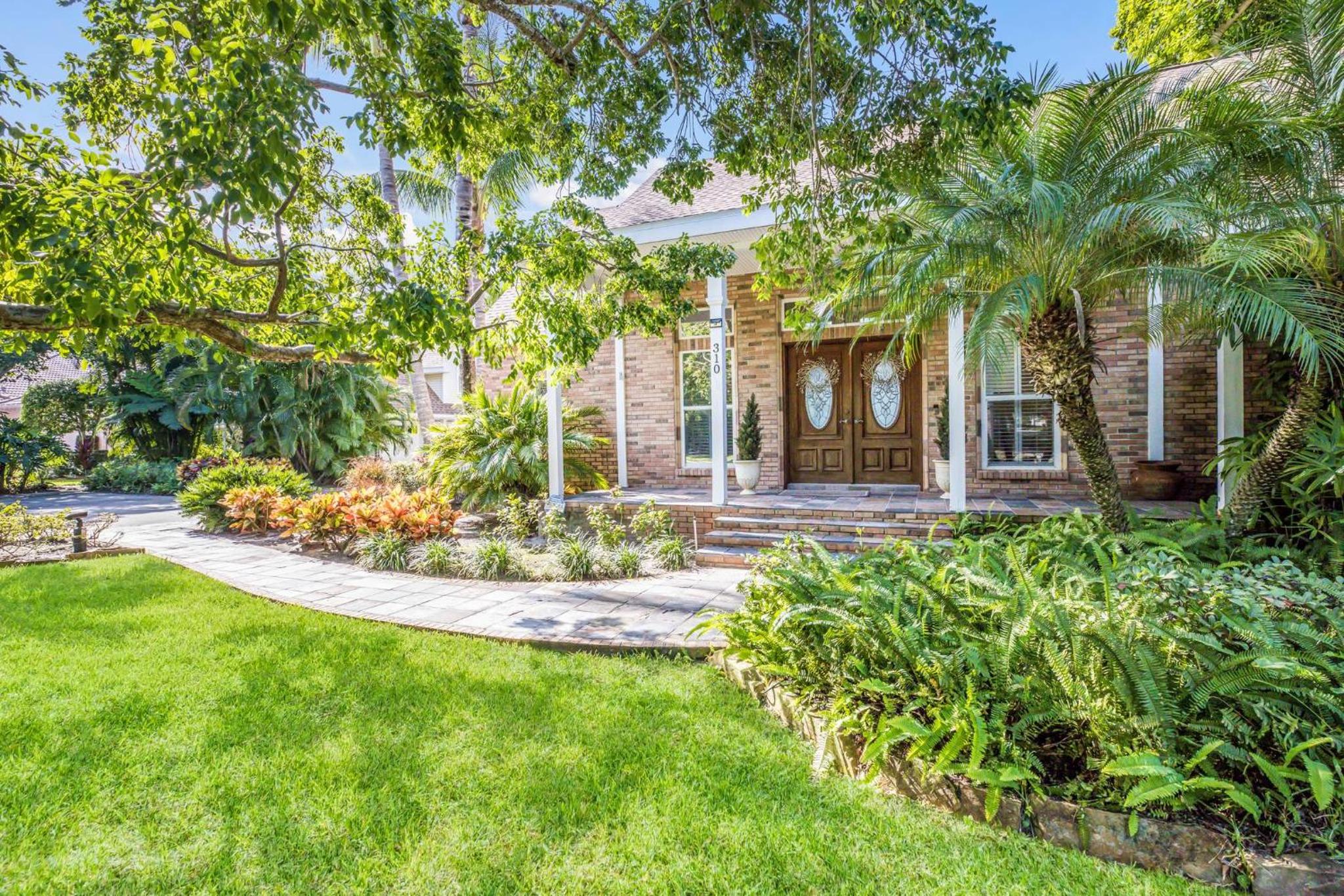 Palma Sola Bay House! Private Dock, Heated Pool & Spa, Game Room & More! view 5