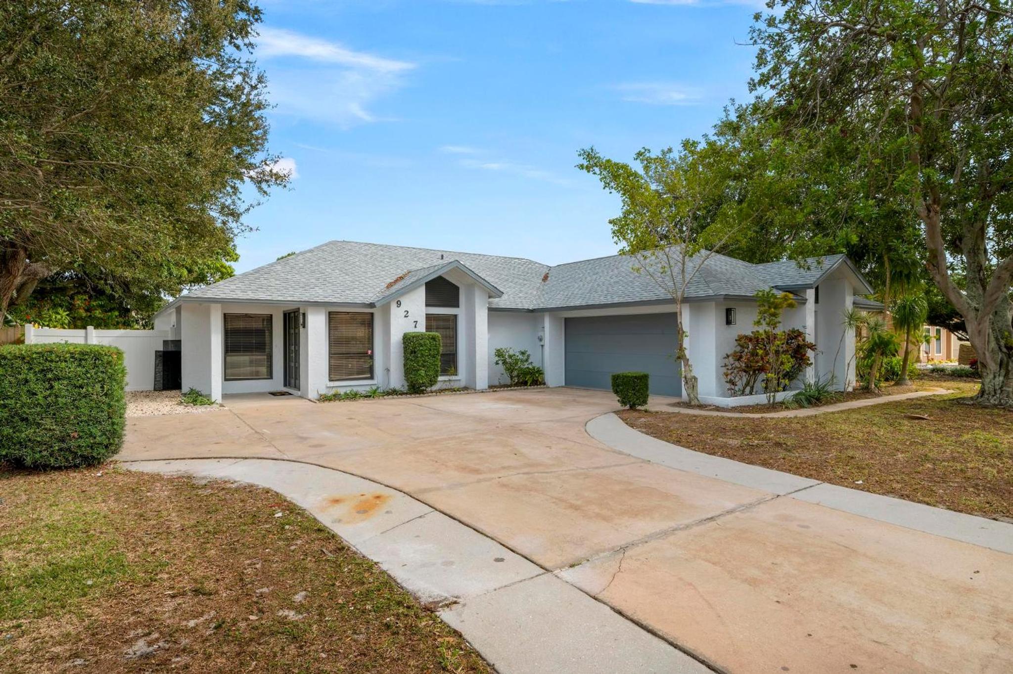 Tropical Tranquility! Luxury pool home with lakefront view just minutes from the beach! view 4