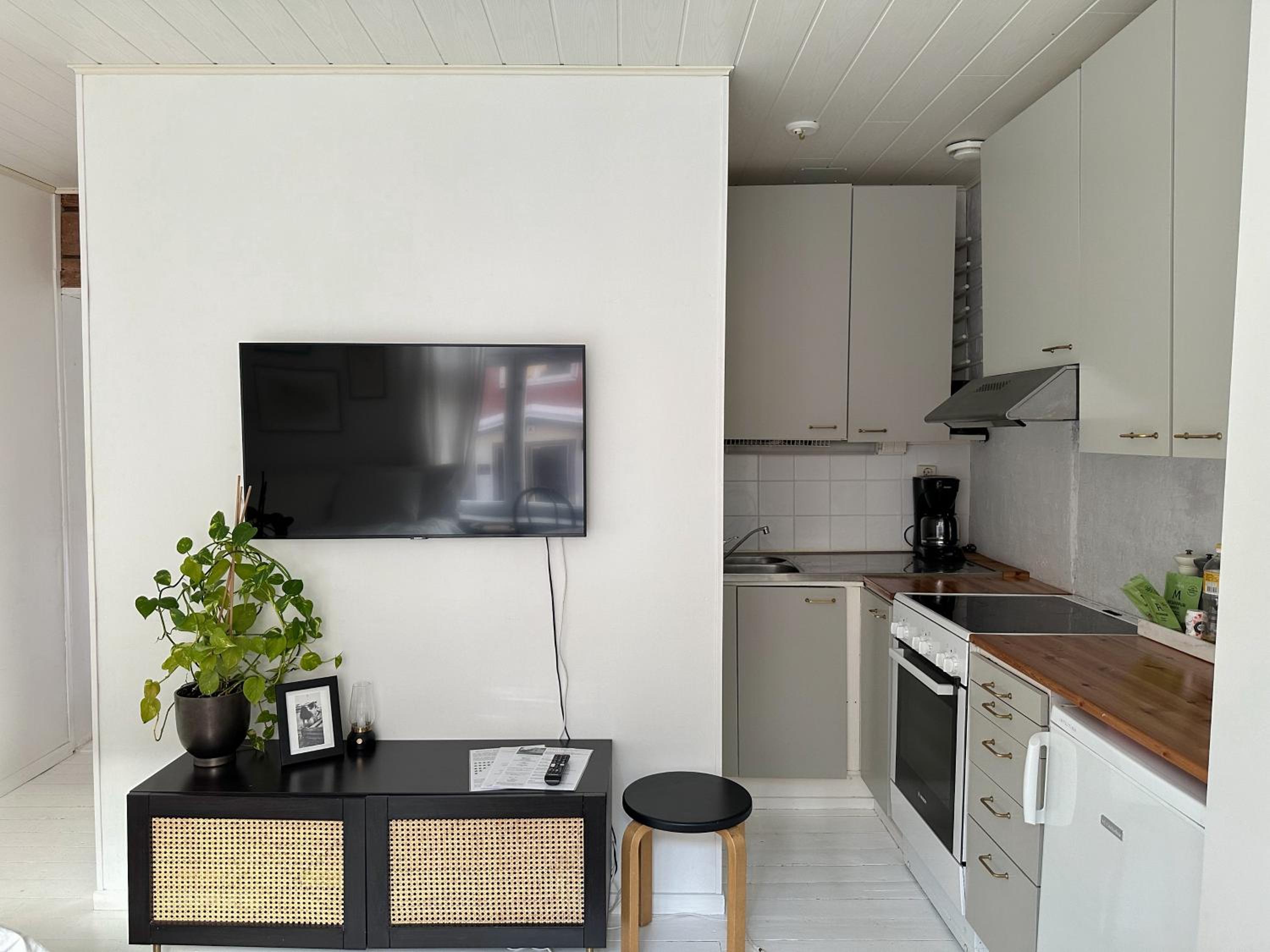 Wooden house studio with shared garden