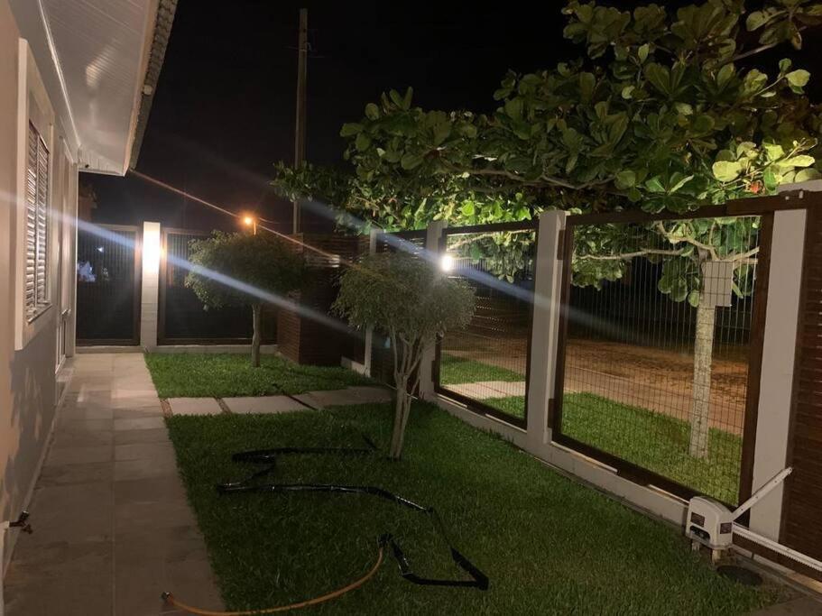 Linda casa na praia com piscina 4 quartos