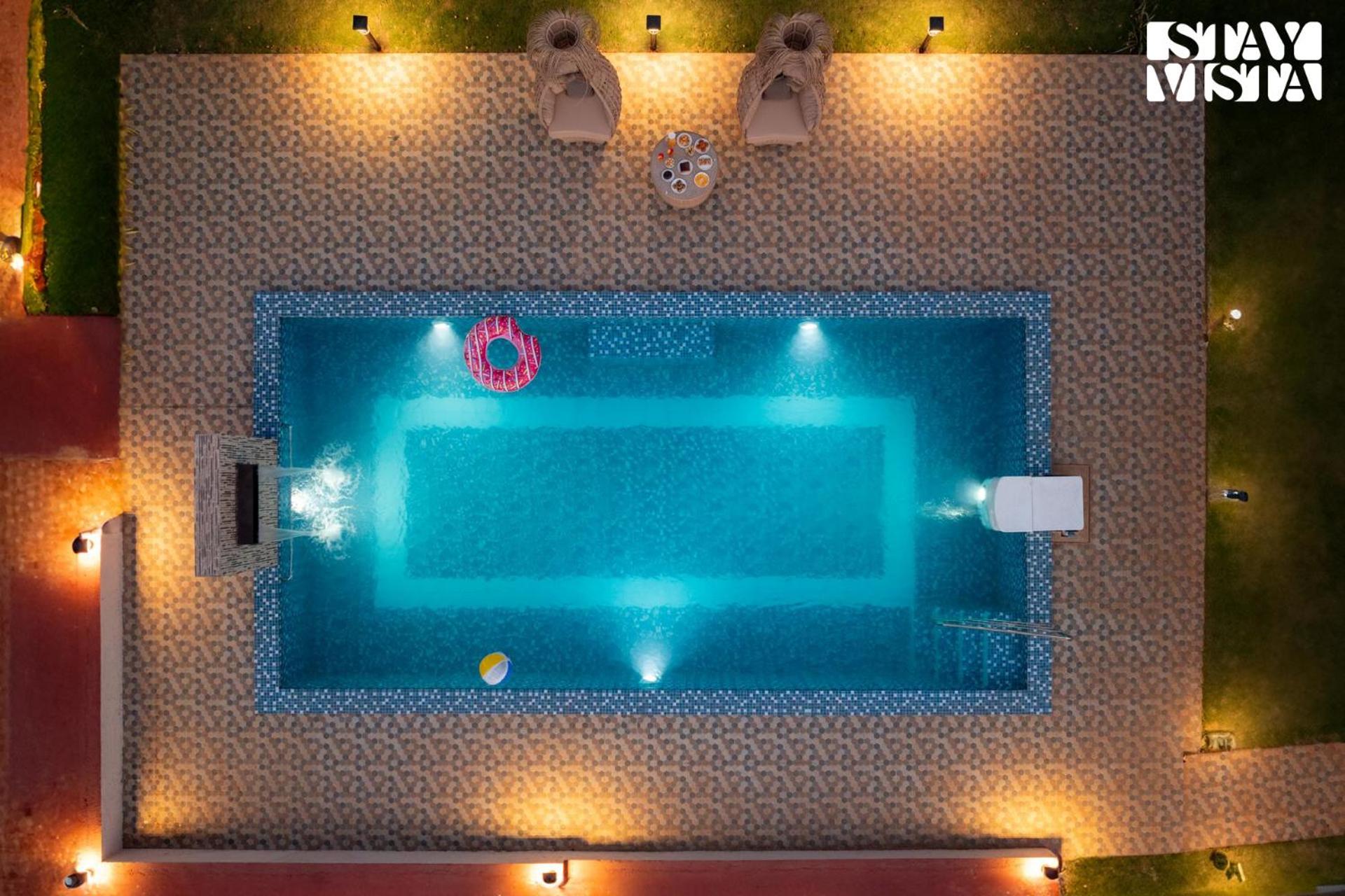 Sun N Sky by StayVista - Poolside villa with chic interiors, lawn & gazebo view 3