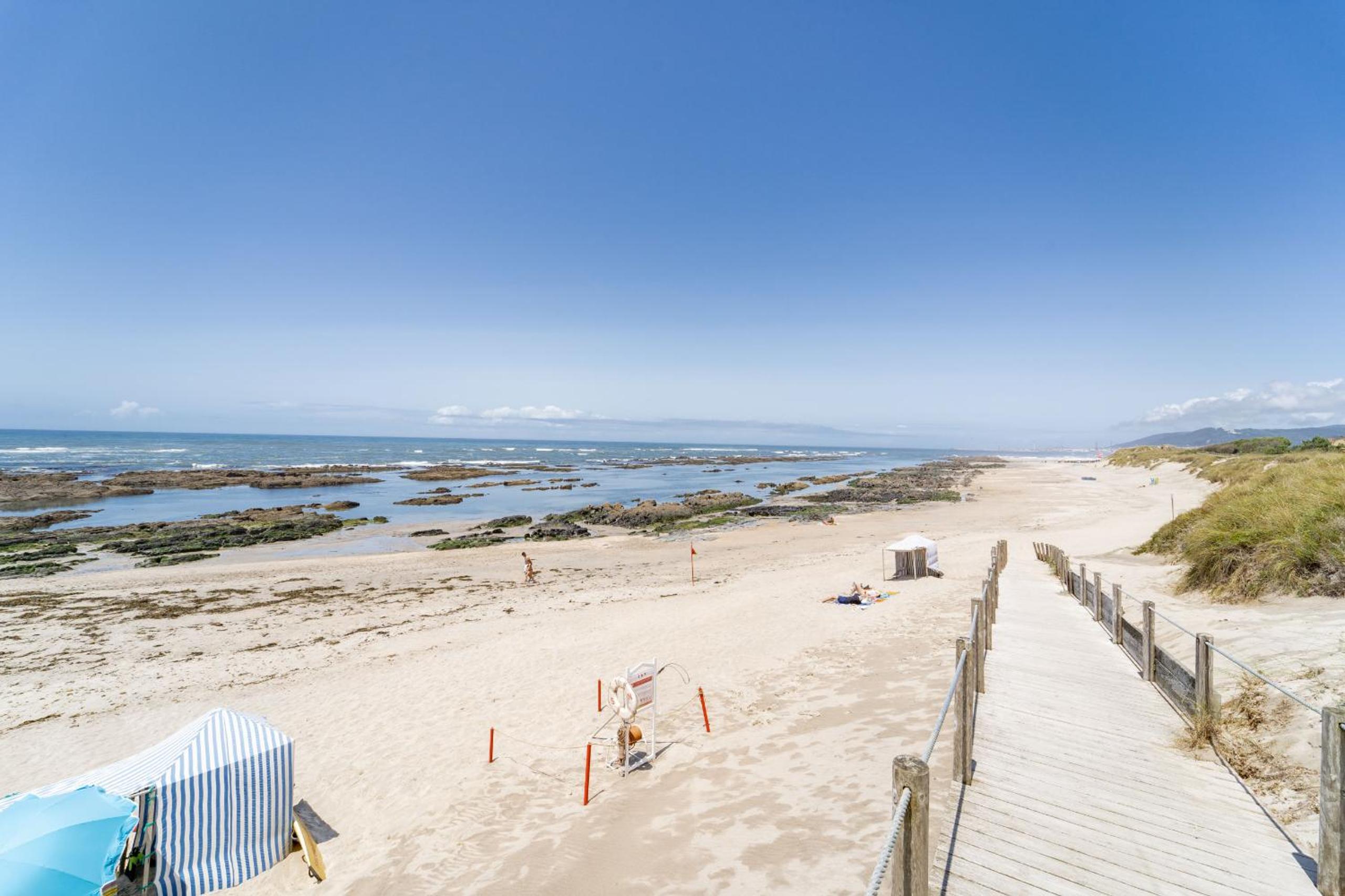 Beach Flat by House and People view 3