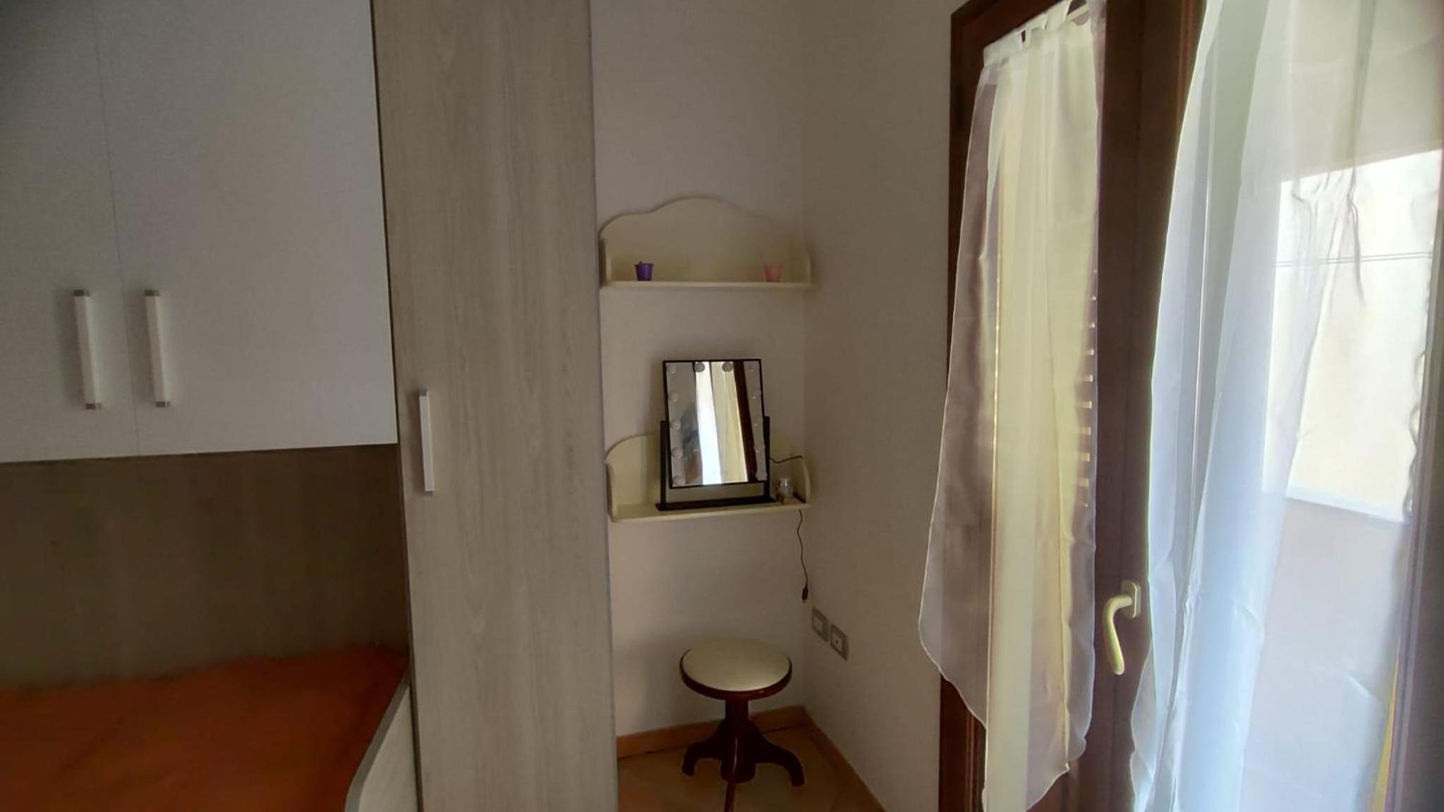 Sara Sole & Mare en Torpè — hotel room