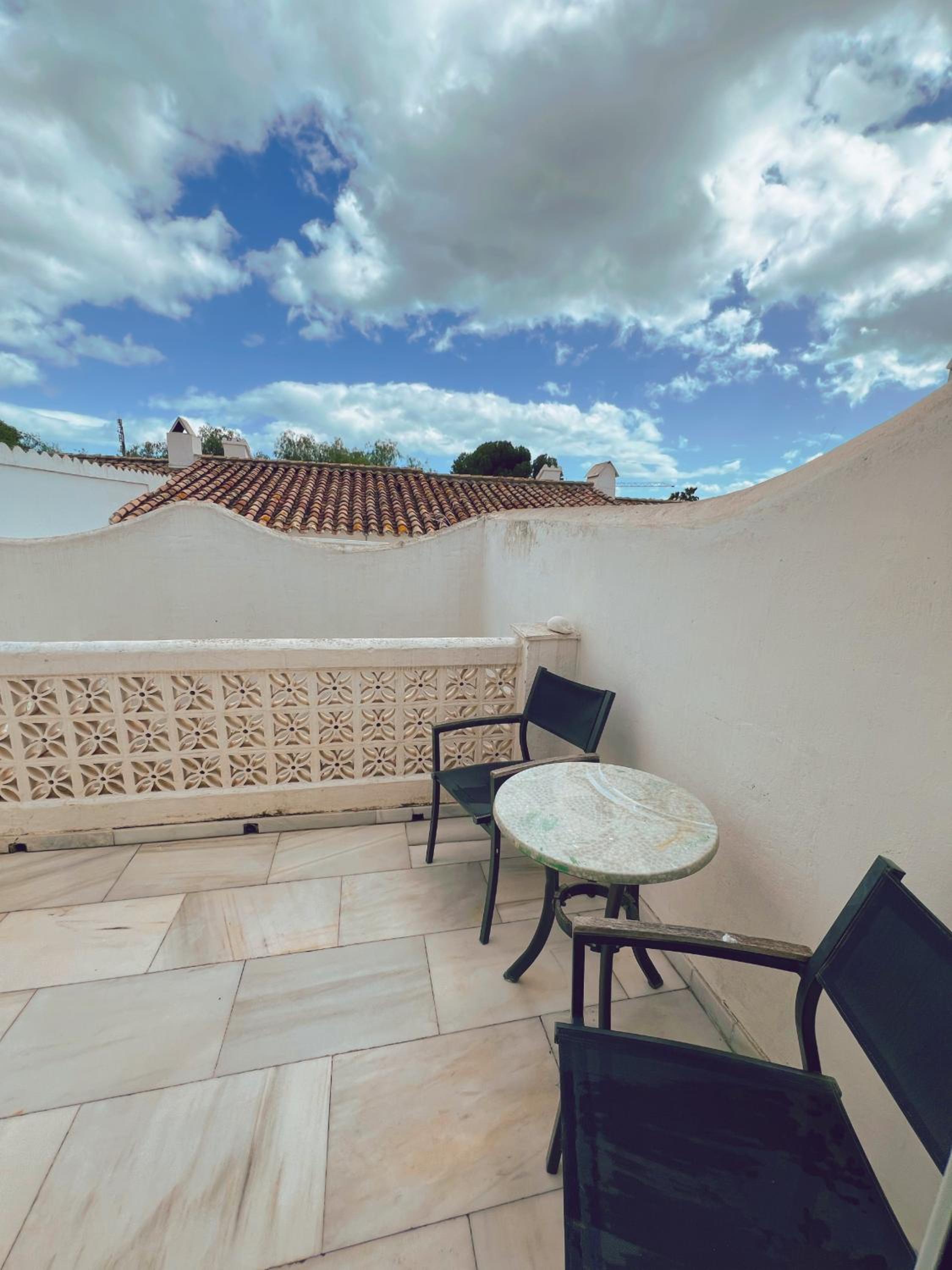 Patio Alcornocal by Residea