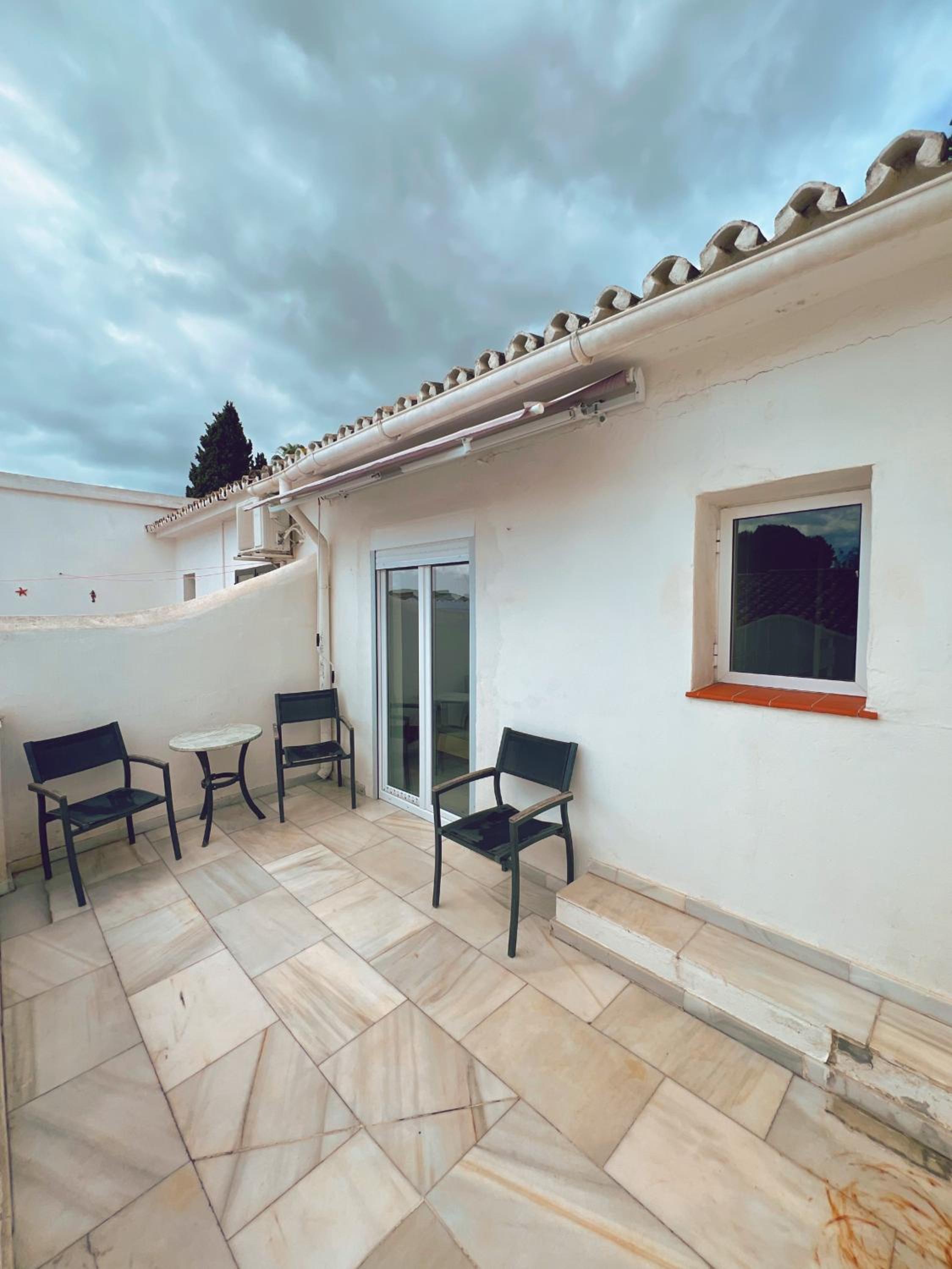 Patio Alcornocal by Residea