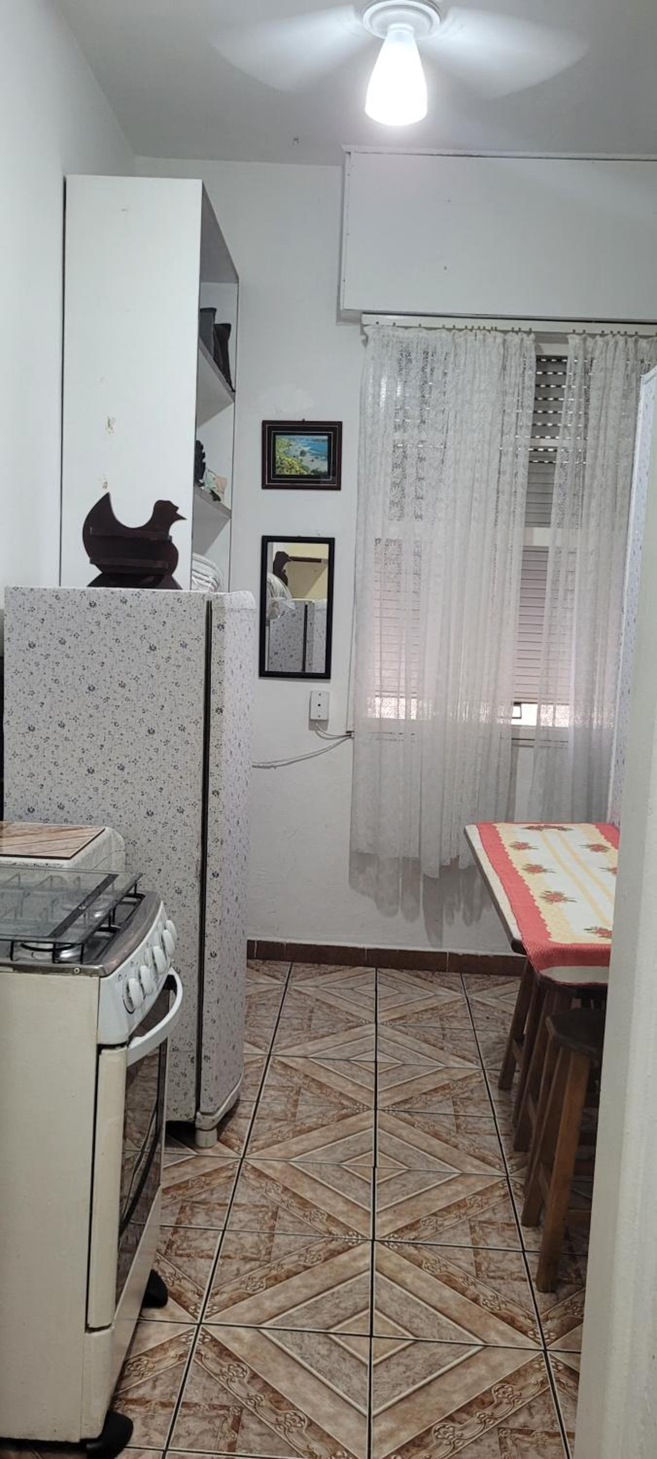 Apto no Embaré pé na areia