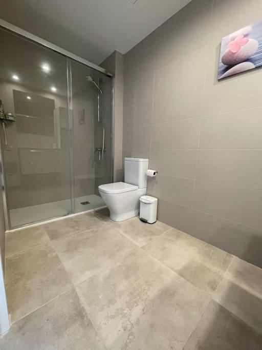 Apartment by the beach with pool and private parking
