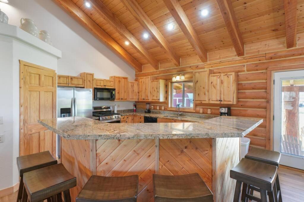 Splendor Valley Farms Huge Log Cabin with King Bed Bunk Beds and Game Room view 4