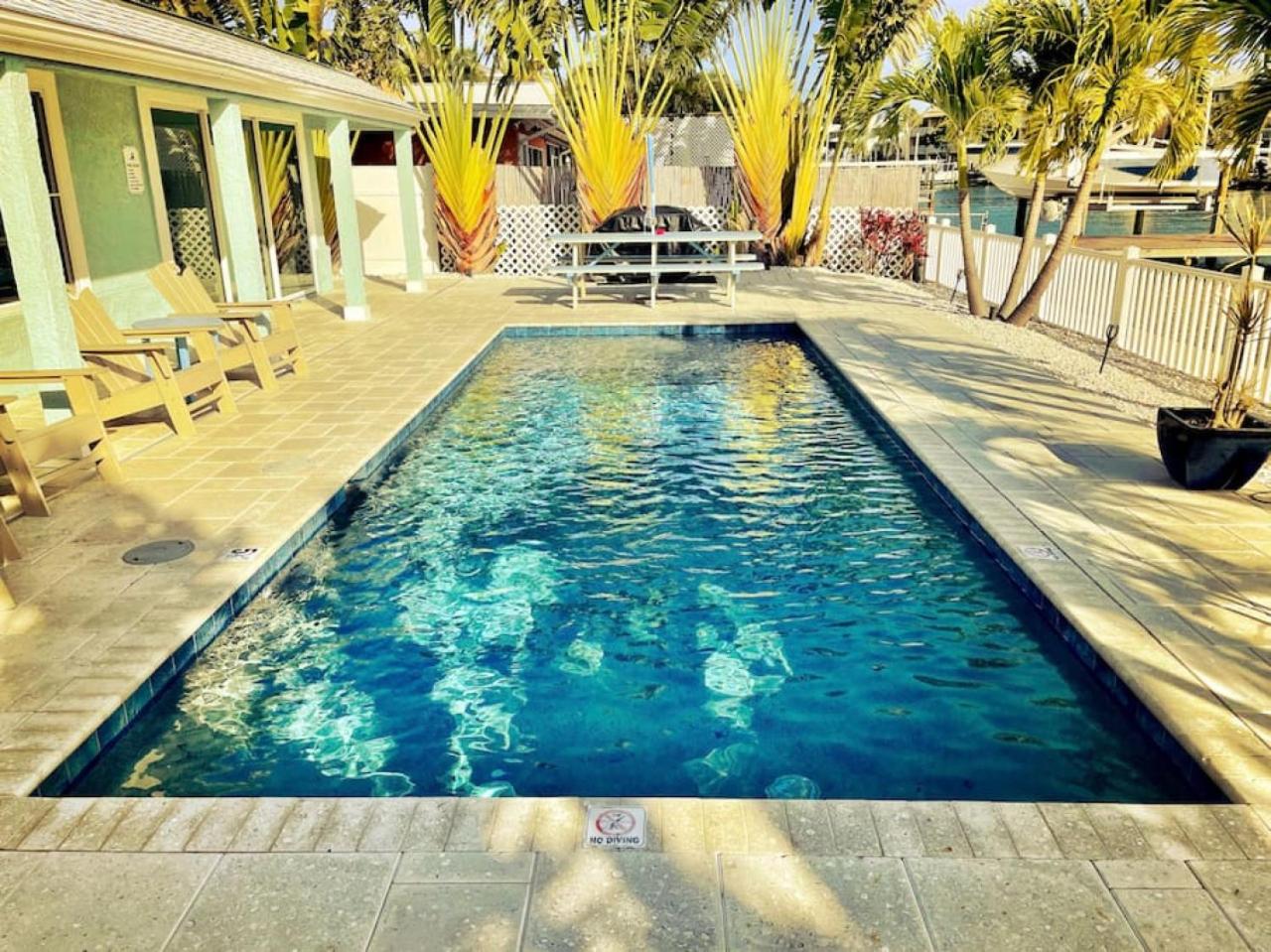 Waterfront Family Compound - Free Golf Cart, Paddleboards, Heated Pool, Golden Tee 2025 Arcade Game