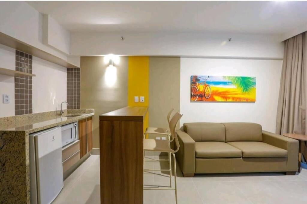 Flat encantador com piscinas aquecidas, academia e playground