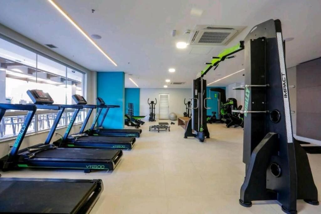 Flat encantador com piscinas aquecidas, academia e playground