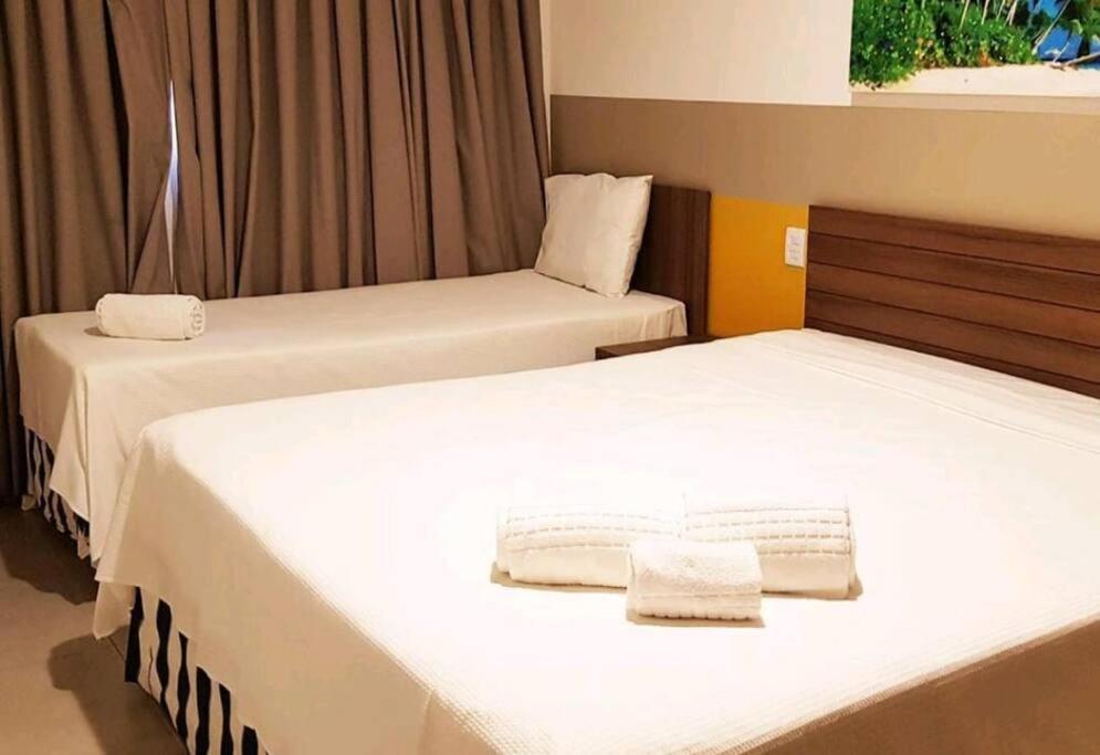 Flat encantador com piscinas aquecidas, academia e playground