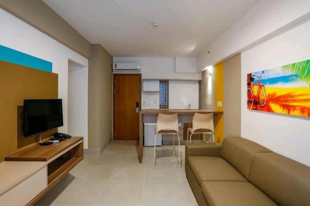 Flat encantador com piscinas aquecidas, academia e playground