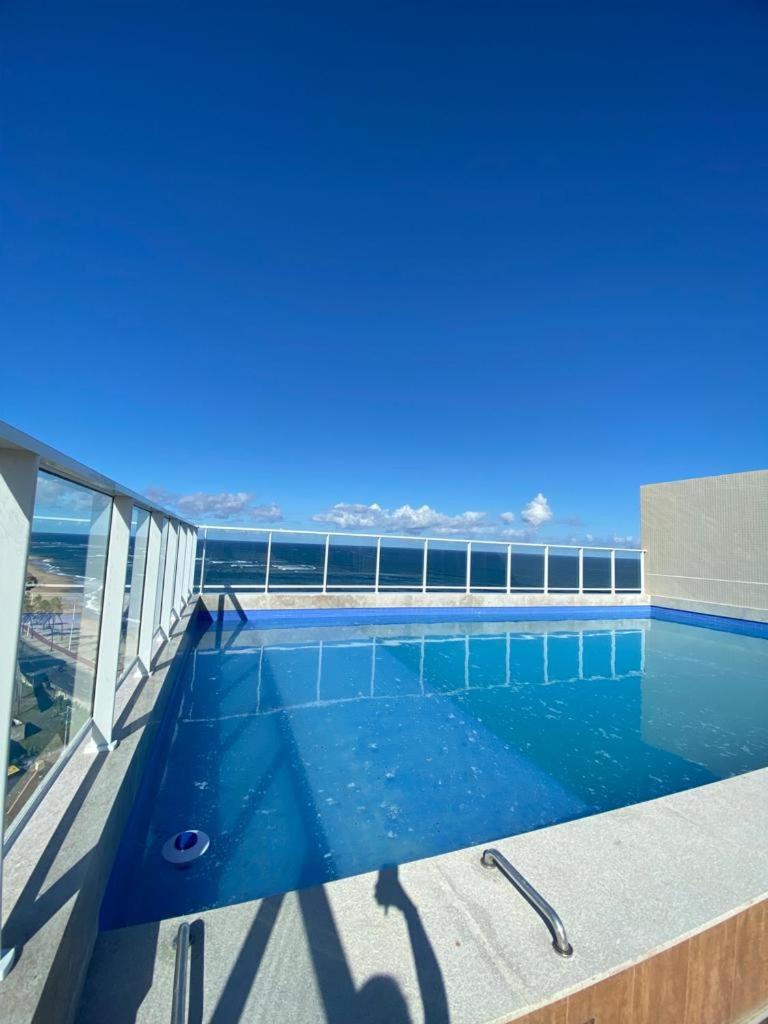 Studio pé na areia