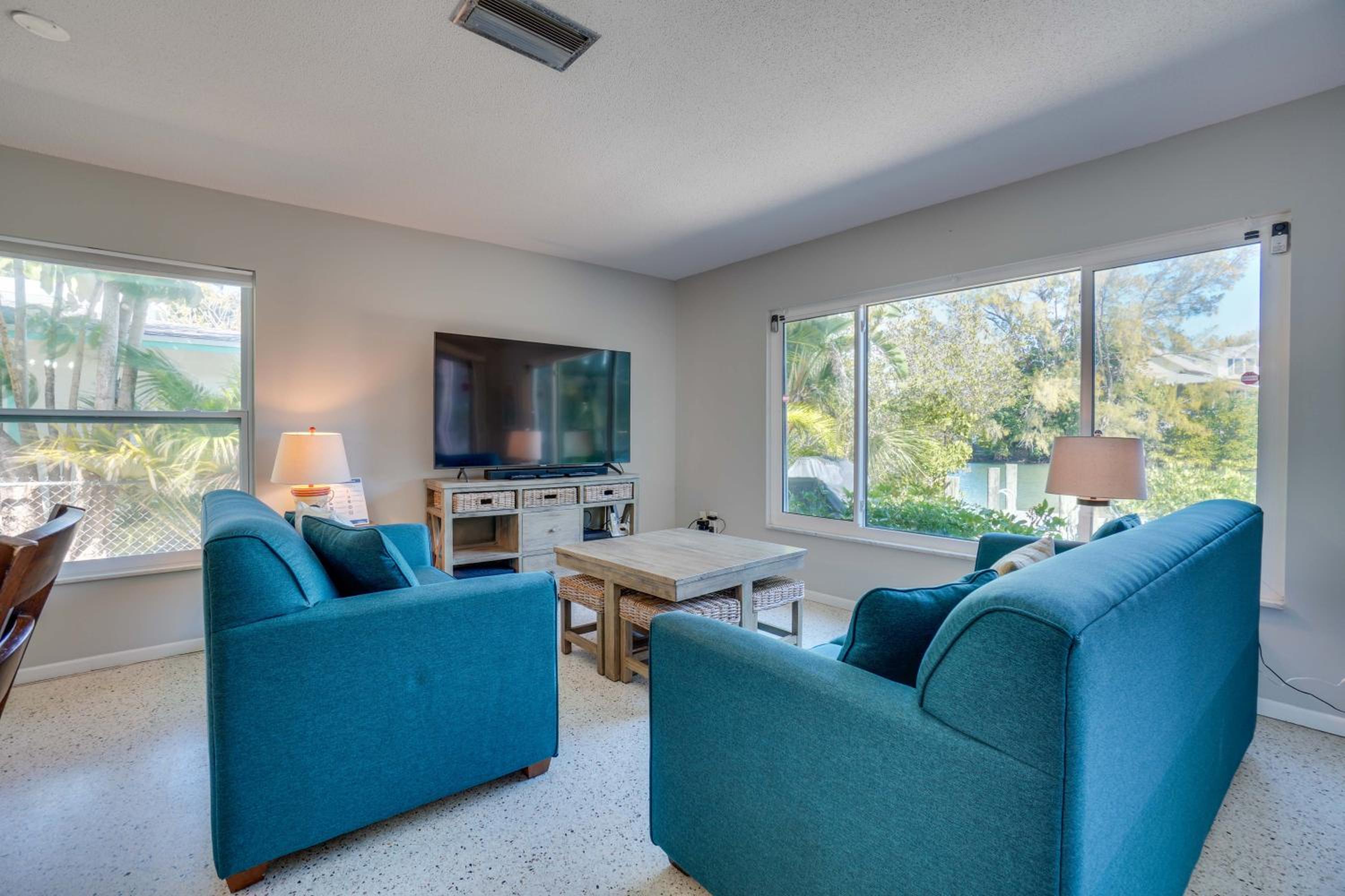 Canal Front Home with Large Boat Dock, 3 Min Walk to Beach