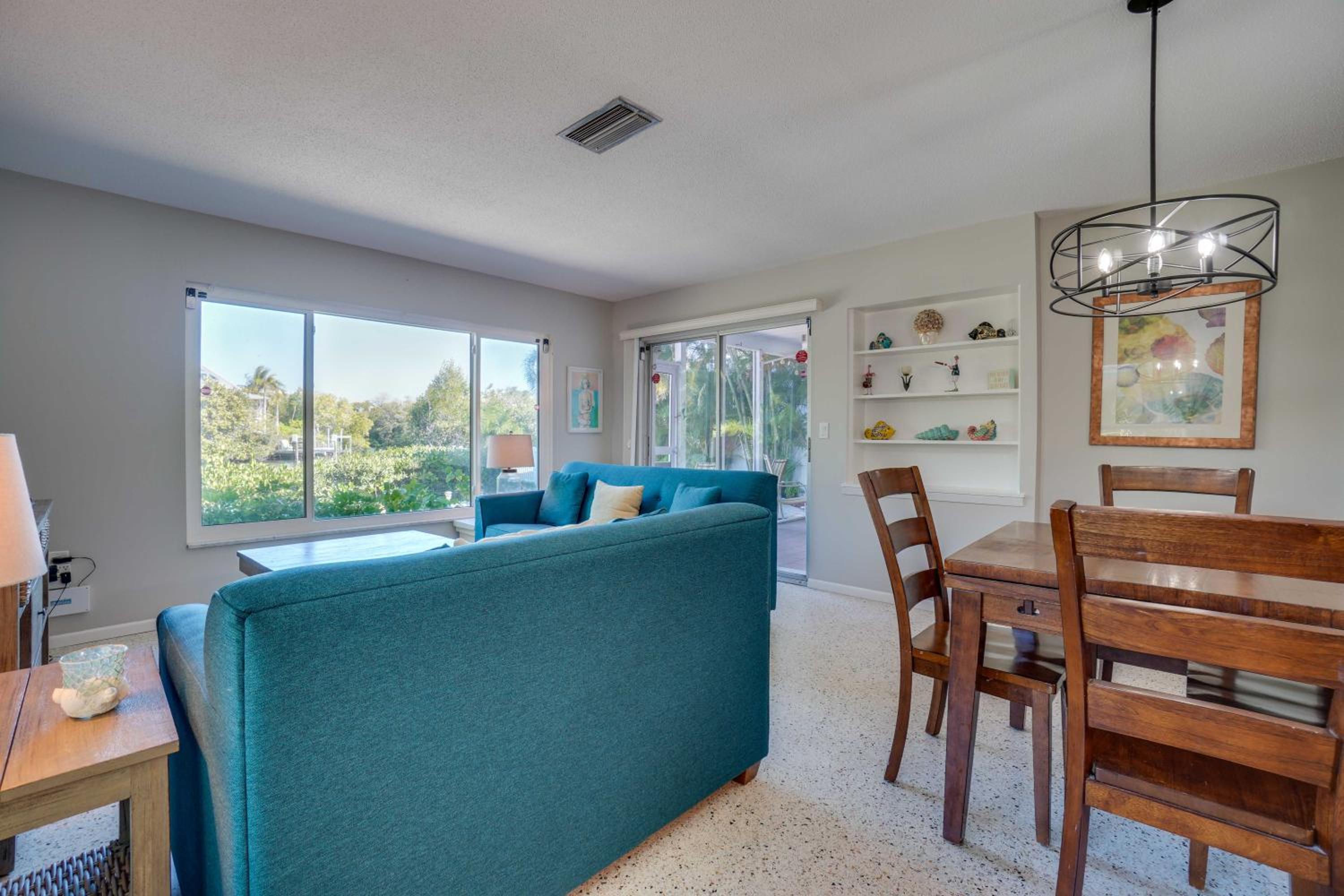 Canal Front Home with Large Boat Dock, 3 Min Walk to Beach