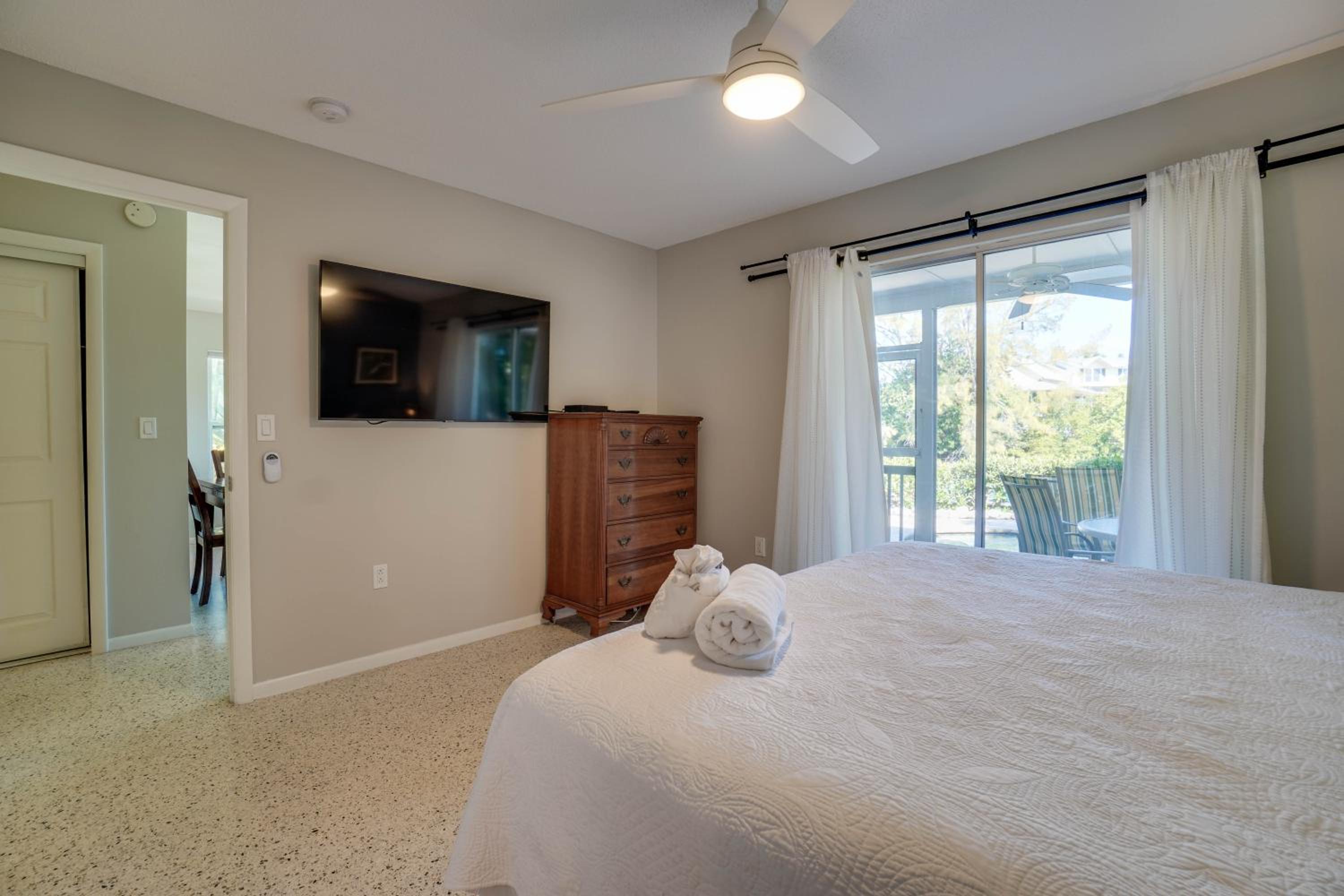 Canal Front Home with Large Boat Dock, 3 Min Walk to Beach