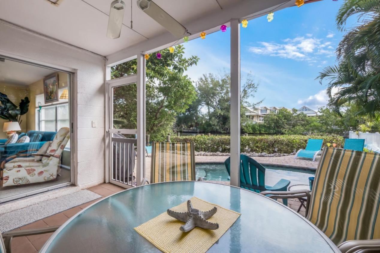 Canal Front Home with Large Boat Dock, 3 Min Walk to Beach
