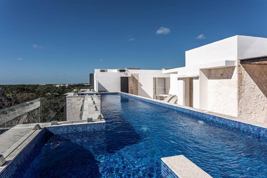 Moderno Departamento EcoChic en Aldea Zama Tulum view 5