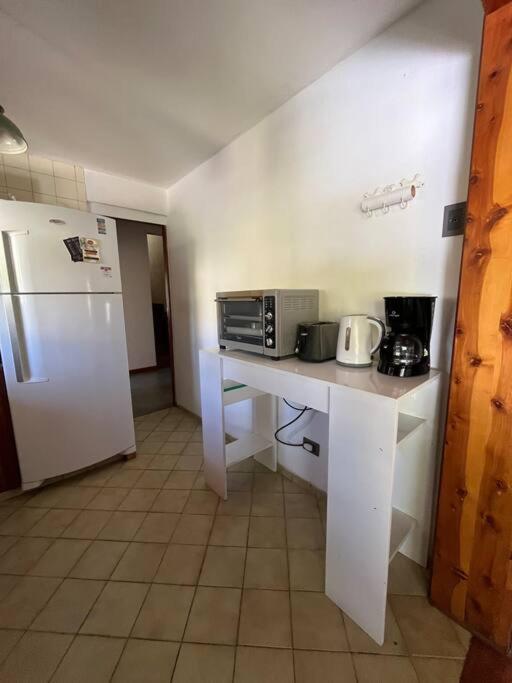 QUIME CHE. Casa con jardín, parrilla y cochera.