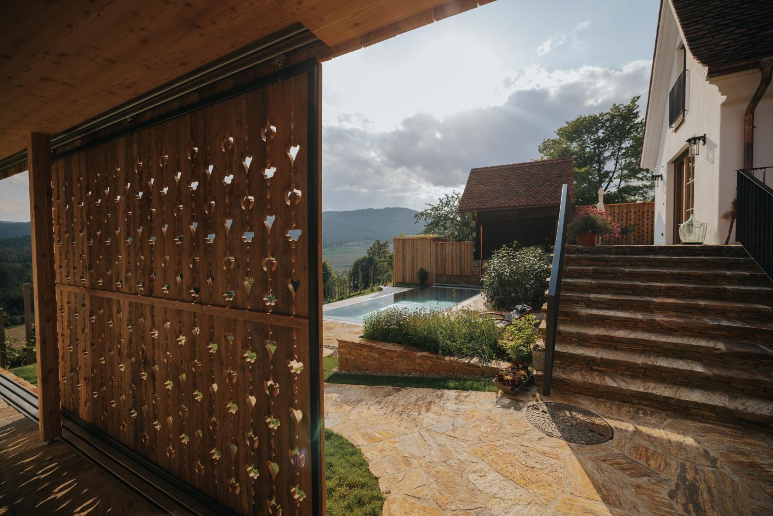 Am Wildbachberg - Luxus Ferienhäuser mit Infinitypool, Privatsauna und Weinkeller