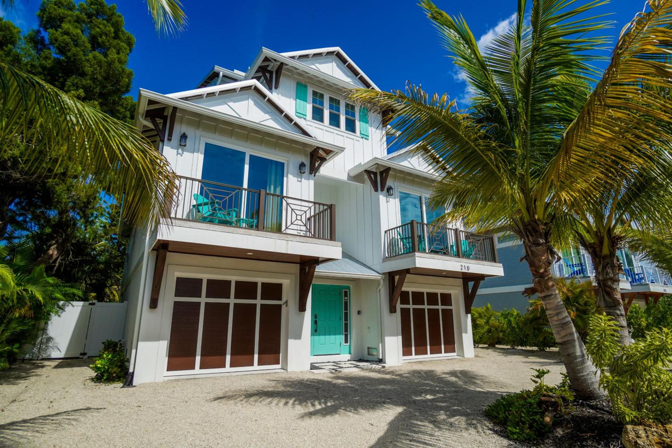 Golf Cart included, private home and only steps to the beach
