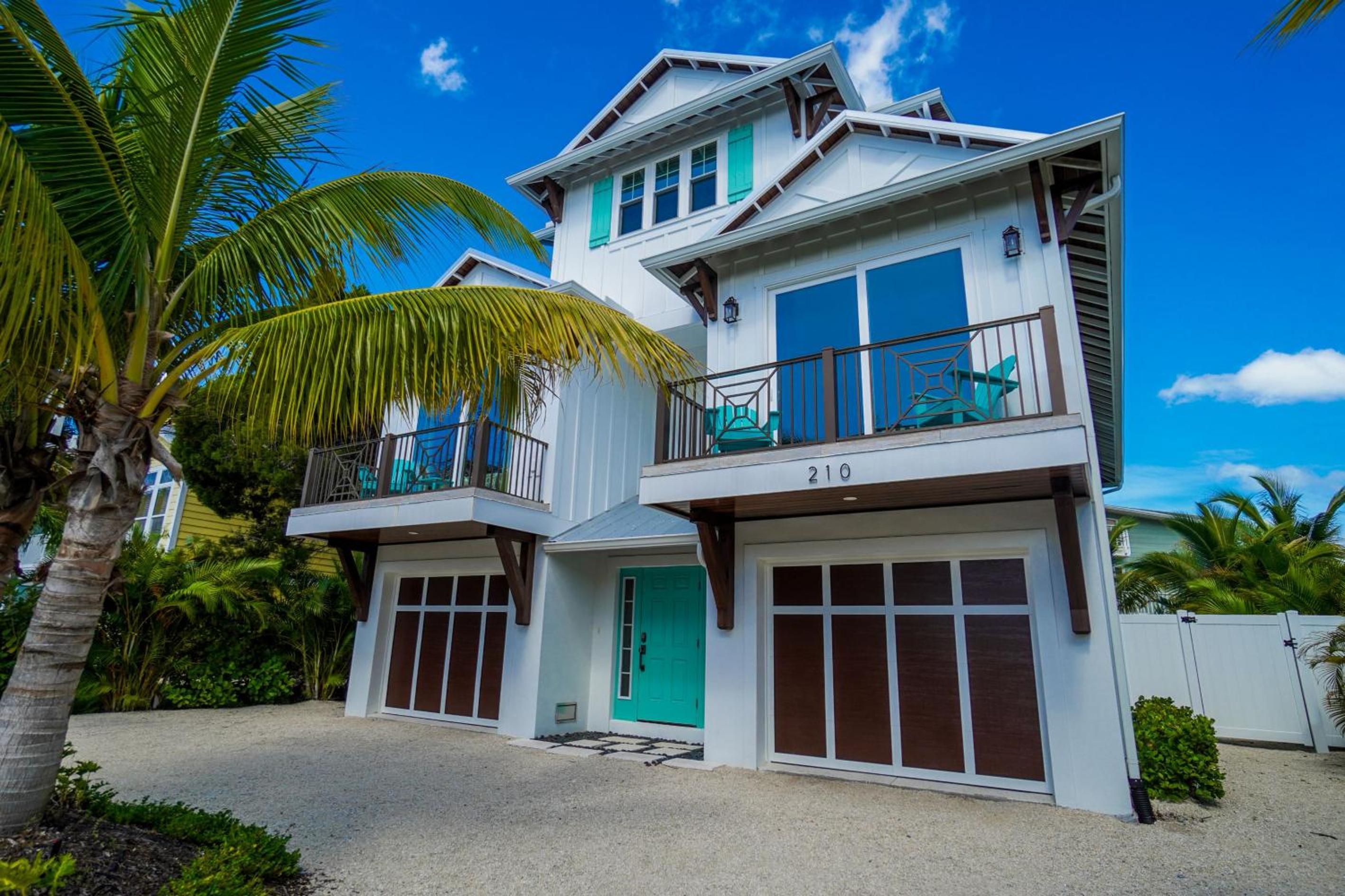 Golf Cart included, private home and only steps to the beach