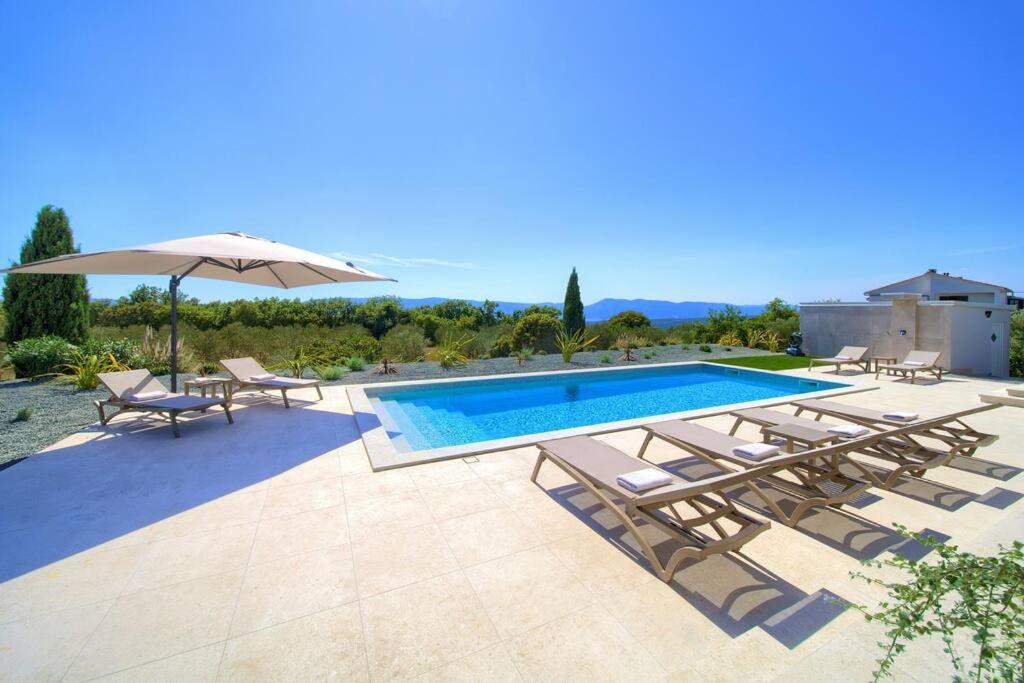 Luxury Villa Harmony with heated pool and seaview view 5