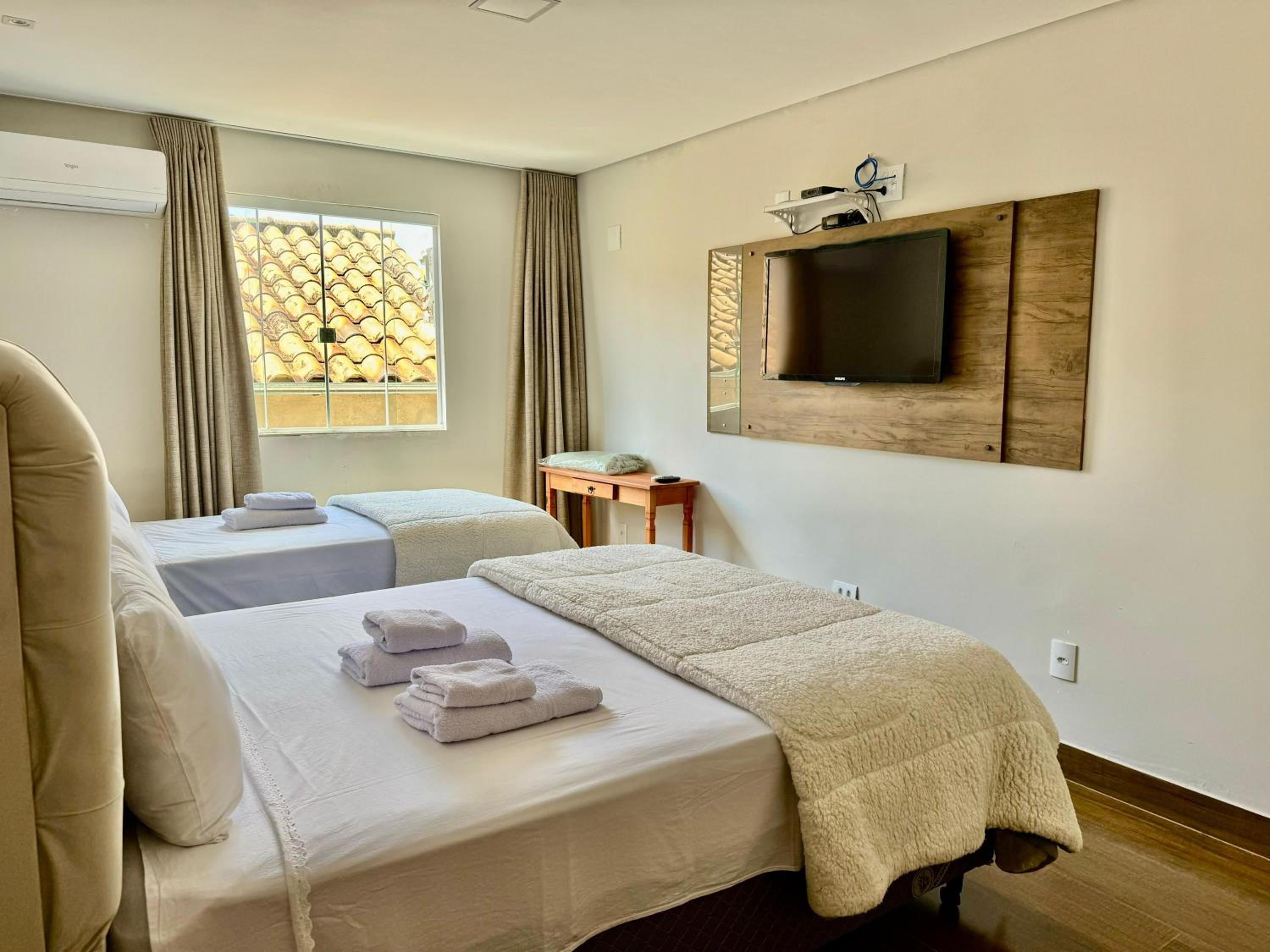 Apartamentos a 200m do centro - Hospedaria Villa da Pedra
