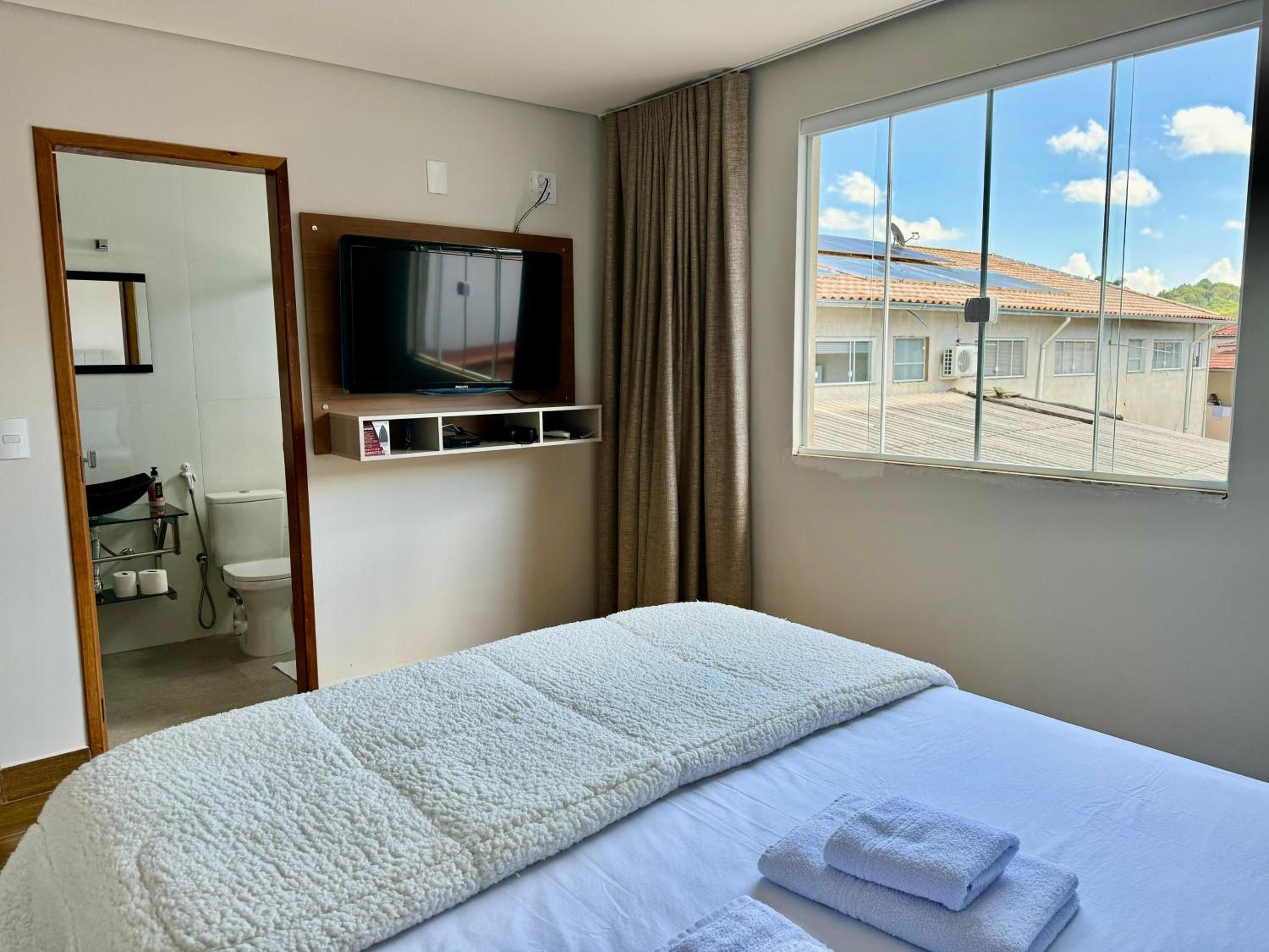 Apartamentos a 200m do centro - Hospedaria Villa da Pedra