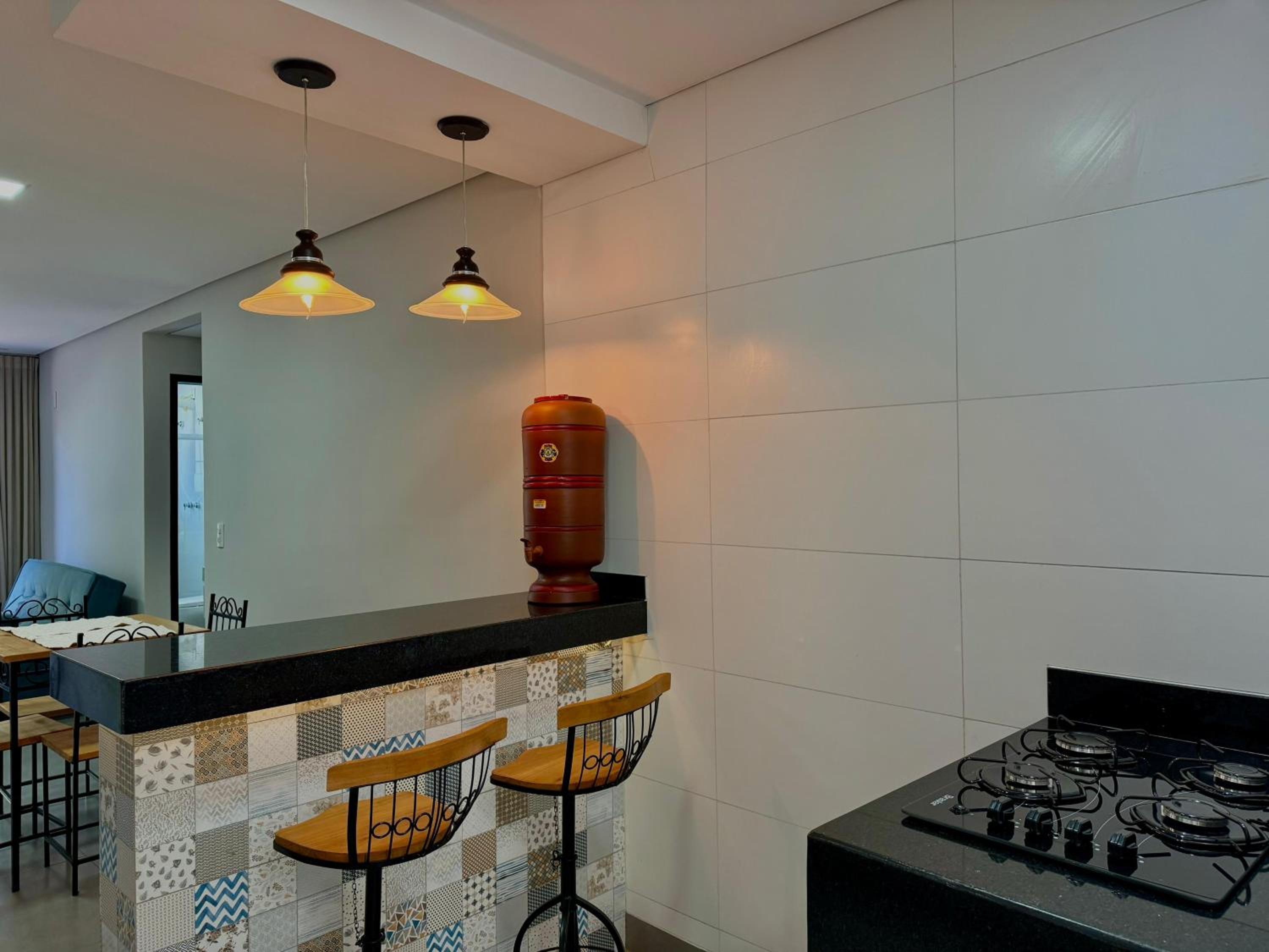 Apartamentos a 200m do centro - Hospedaria Villa da Pedra